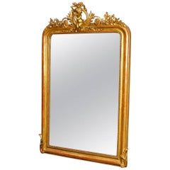 French Mirror in Giltwood and Plaster with Little Angel from 19th Century