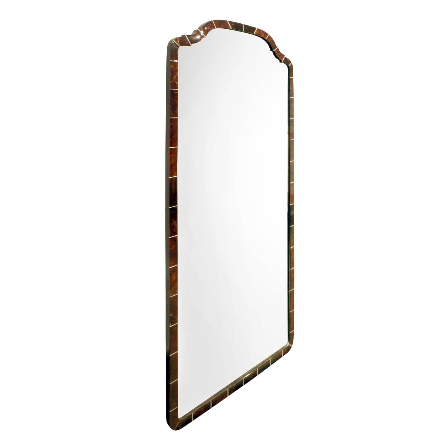 Art Deco studio crafted mirror in tortoiseshell with bone inlays, France, 1930s. This mirror is beautifully made.