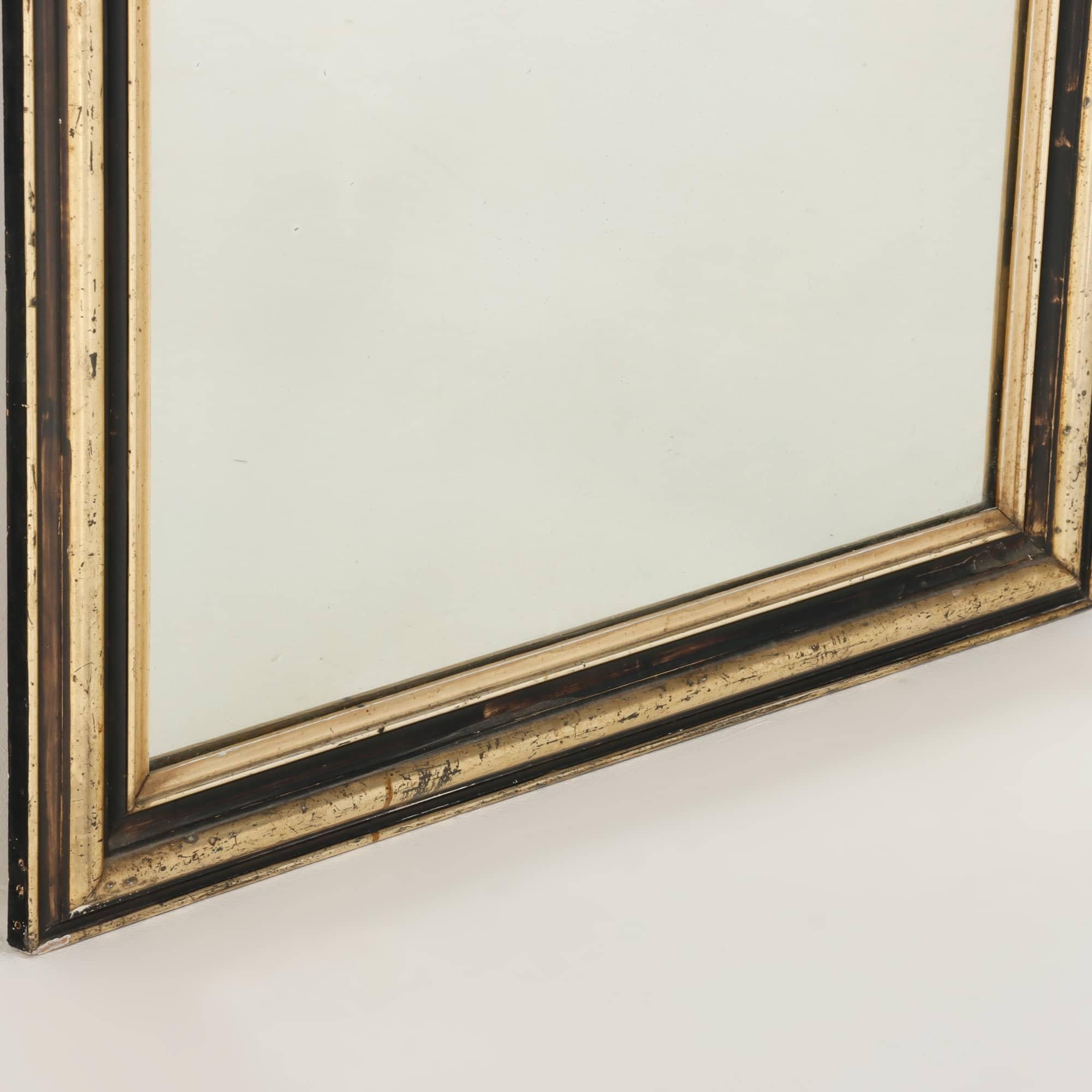Mid-19th Century French mirror with partial ebonized and gilt frame C 1860. For Sale