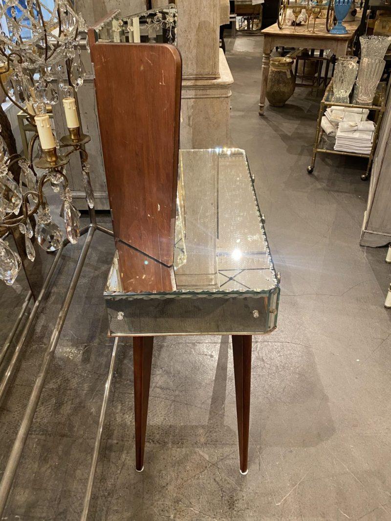 Stunningly beautiful dressing table in Venetian style, France circa 1920-40s.

There are 3 drawers with faceted glass on the fronts, as well as a 3-winged mirror with the finest ornamentation and facetwork.

Measurement breakdown:

Height from table
