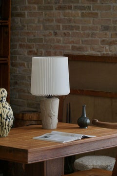 French Modern, A Vintage Table Lamp in Stone with Fish Motifs, 1970s
