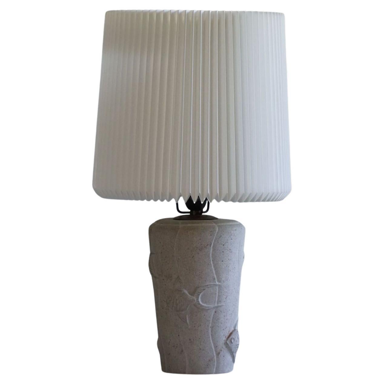 French Modern, A Vintage Table Lamp in Stone with Fish Motifs, 1970s