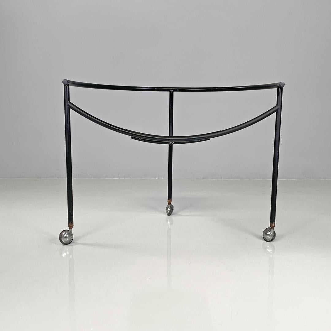 French modern black metal armchair Dr Sonderbar by Philippe Starck for XO, 1980s
Armchair or chair mod. Dr Sonderbar with three wheels. The structure, in black painted metal rod, makes up the semicircular backrest that ends in the two armrests and