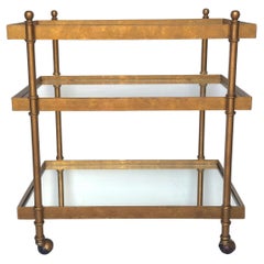 Carrito de bar moderno francés de latón y cristal con estante inferior de espejo, circa años 70