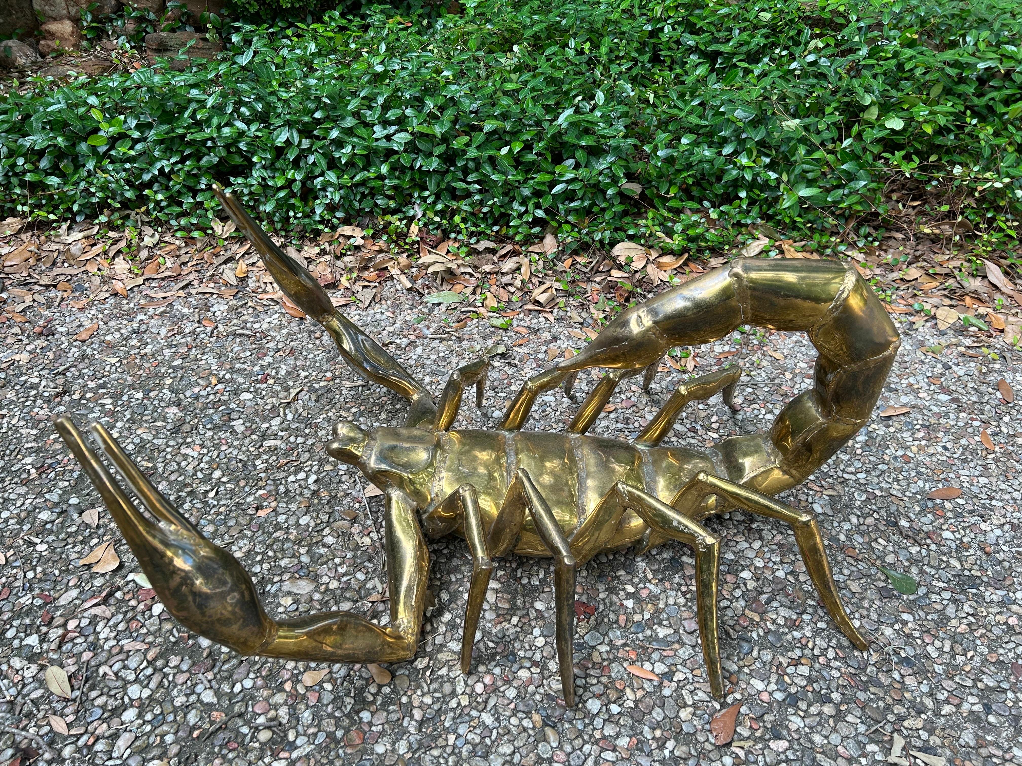 French Modern Brass Scorpion Signed Alain Chervet.
This stunning Hollywood Regency French brass scorpion signed by master sculptor, Alain Chervet 1978 can be used as a sculpture or coffee table base (just add the appropriate size glass).
A true