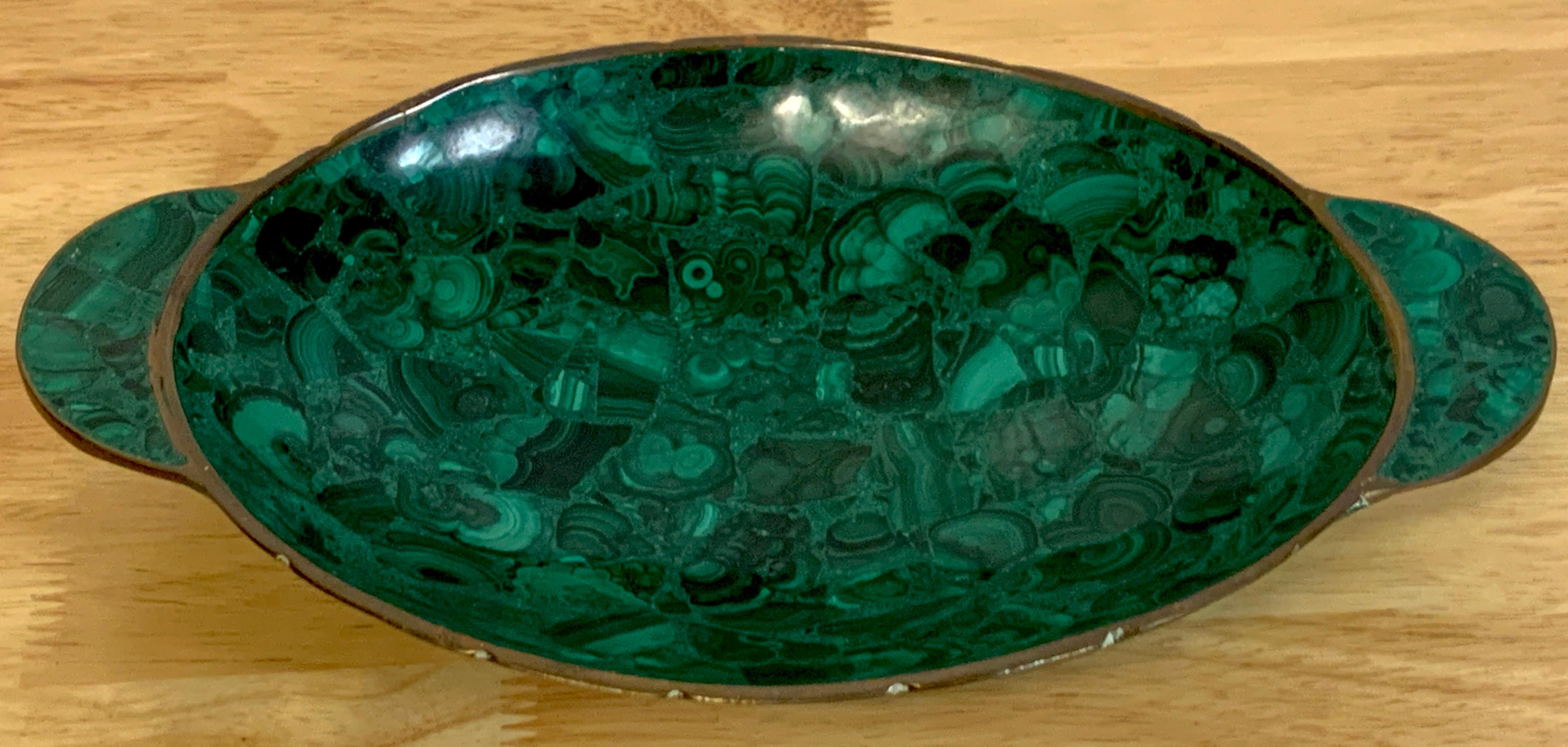 French Modern Bronze & Malachite Clad Vide-Poche, With exquisite all over book-matched malachite veneer on a oval bronze bowl with twin handles. Unmarked
The interior bowl measures 7.5