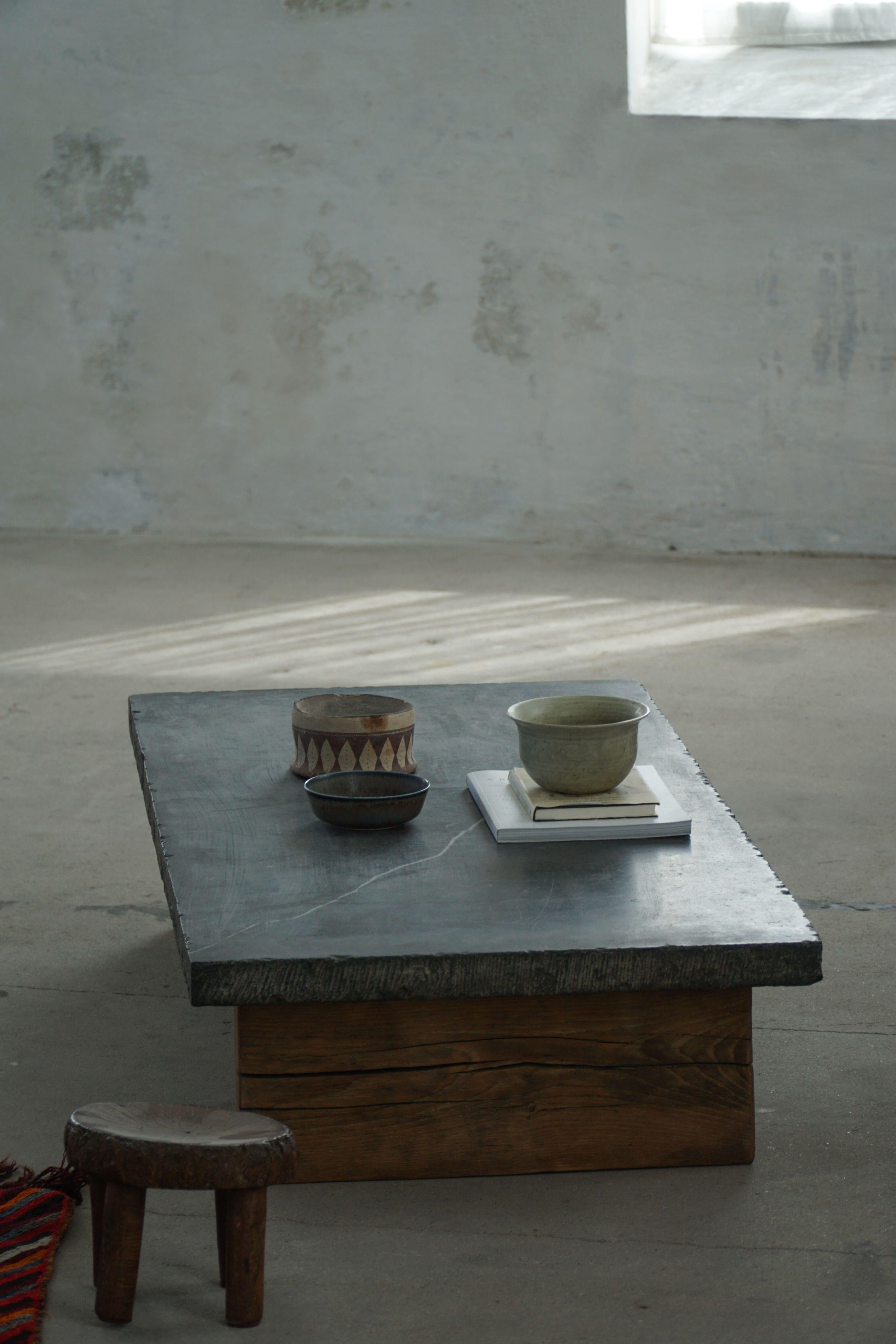 French Modern, Brutalist Stone Slab Coffee Table with Solid Wooden Legs, 1960s In Good Condition For Sale In Odense, DK
