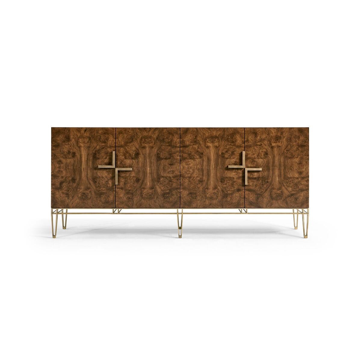 Crafted from rich walnut burl veneers, this sideboard showcases the beauty of natural wood patterns. The stainless-steel exoskeleton base exudes modern sophistication, offering a sturdy foundation that complements the wood's warmth.
The interior of