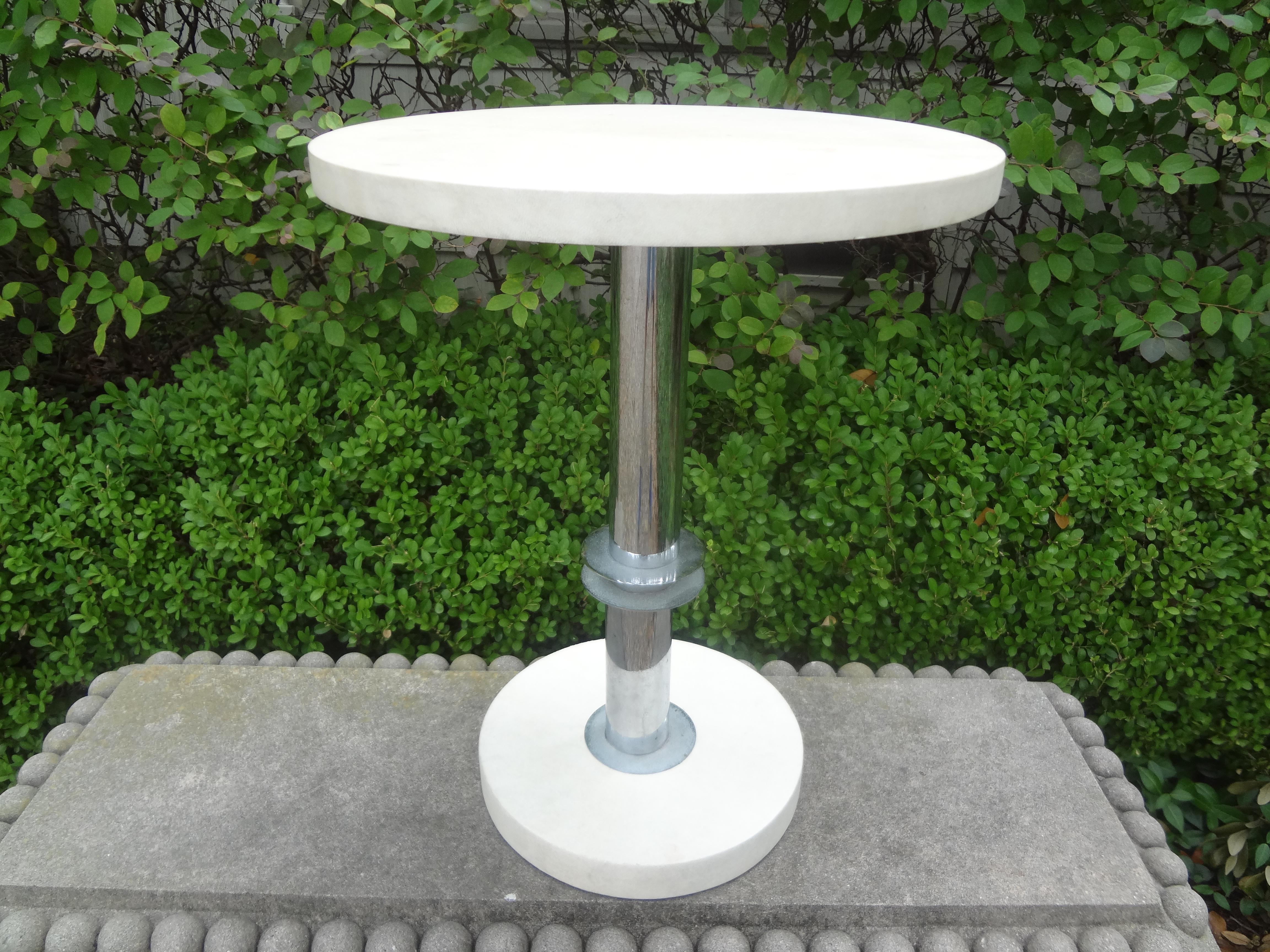 French Modern chrome and parchment table. This french modernist side table, gueridon or cigarette table is made of chrome and parchment. Illegible makers mark from Marseilles on bottom.