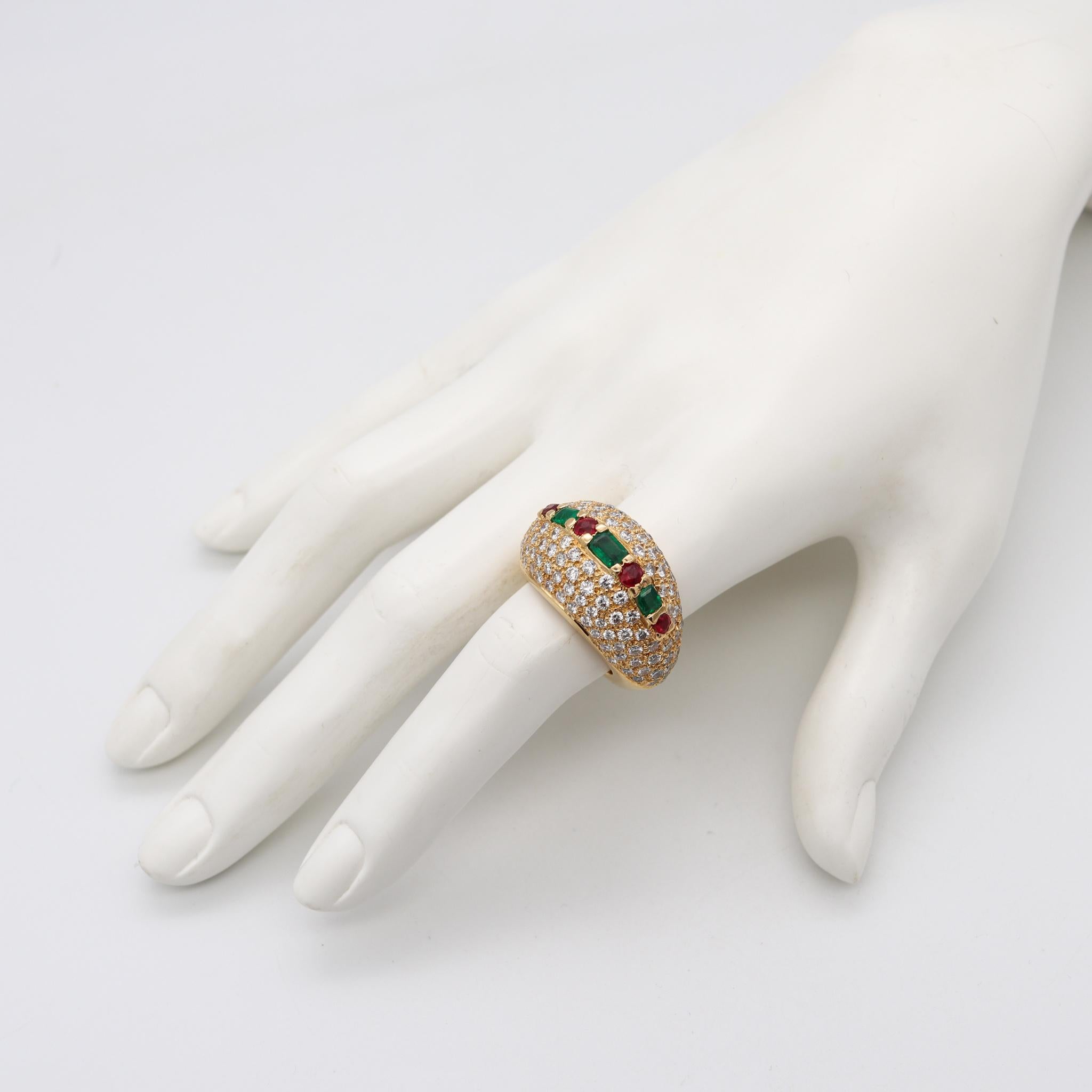A French gem-set cocktail ring.

Fabulous bombe domed cocktail ring, made in France in the late 20th century. It was crafted with impeccable details in solid yellow gold of 18 karats, finished with high polish and embellished with a great selection