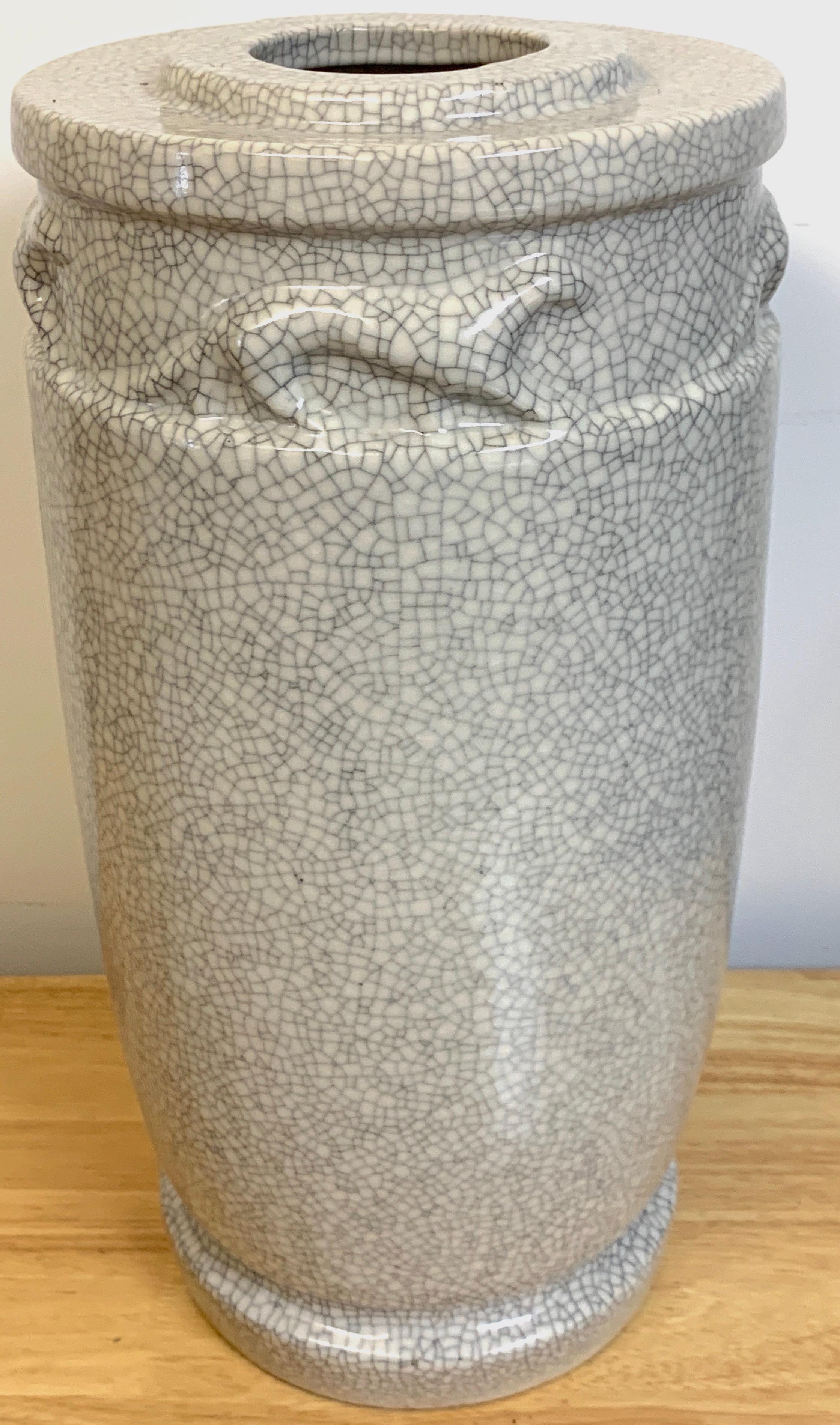 French Modern Crackle Glaze Jaguar Motif Vase, With all over crackle glaze, the upper part with a continuous ring of walking jaguars.