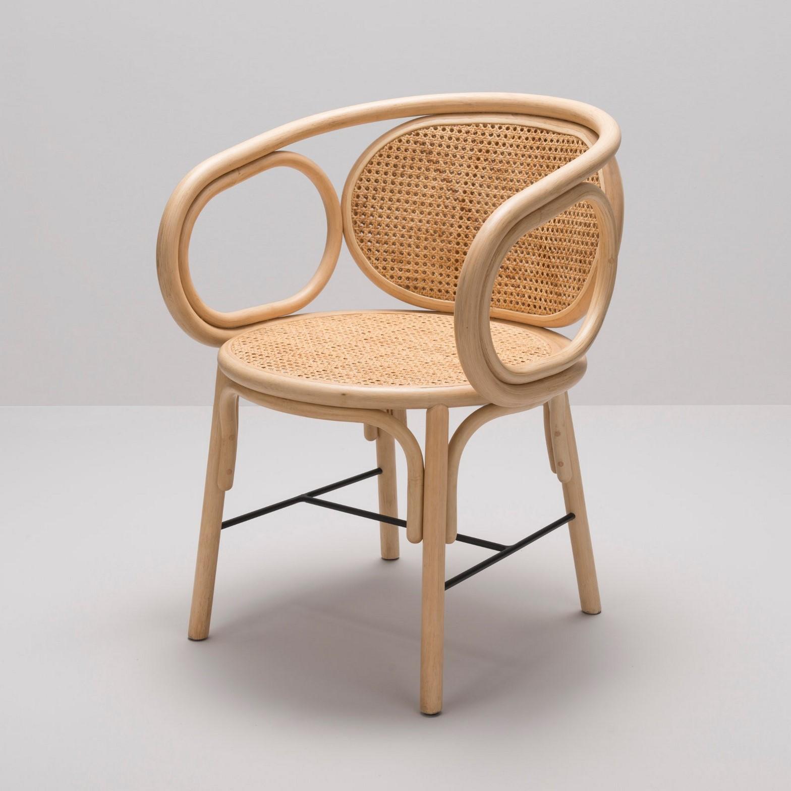 Rattan and woven cane armchair French modern design combining modernity and tradition, design lines, graphic and timelessness this armchair is composed of a robust rattan and airy structure, woven cane and back adorned with a comfy cushion.
Around
