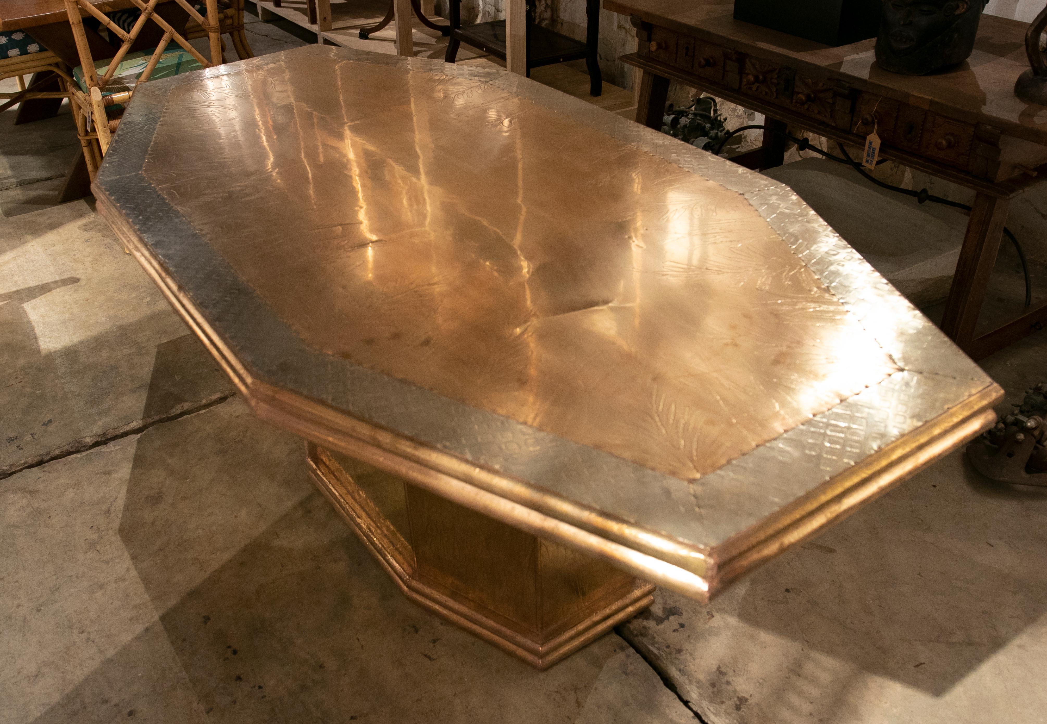 French modern gilded brass table in a golden and silver finish.