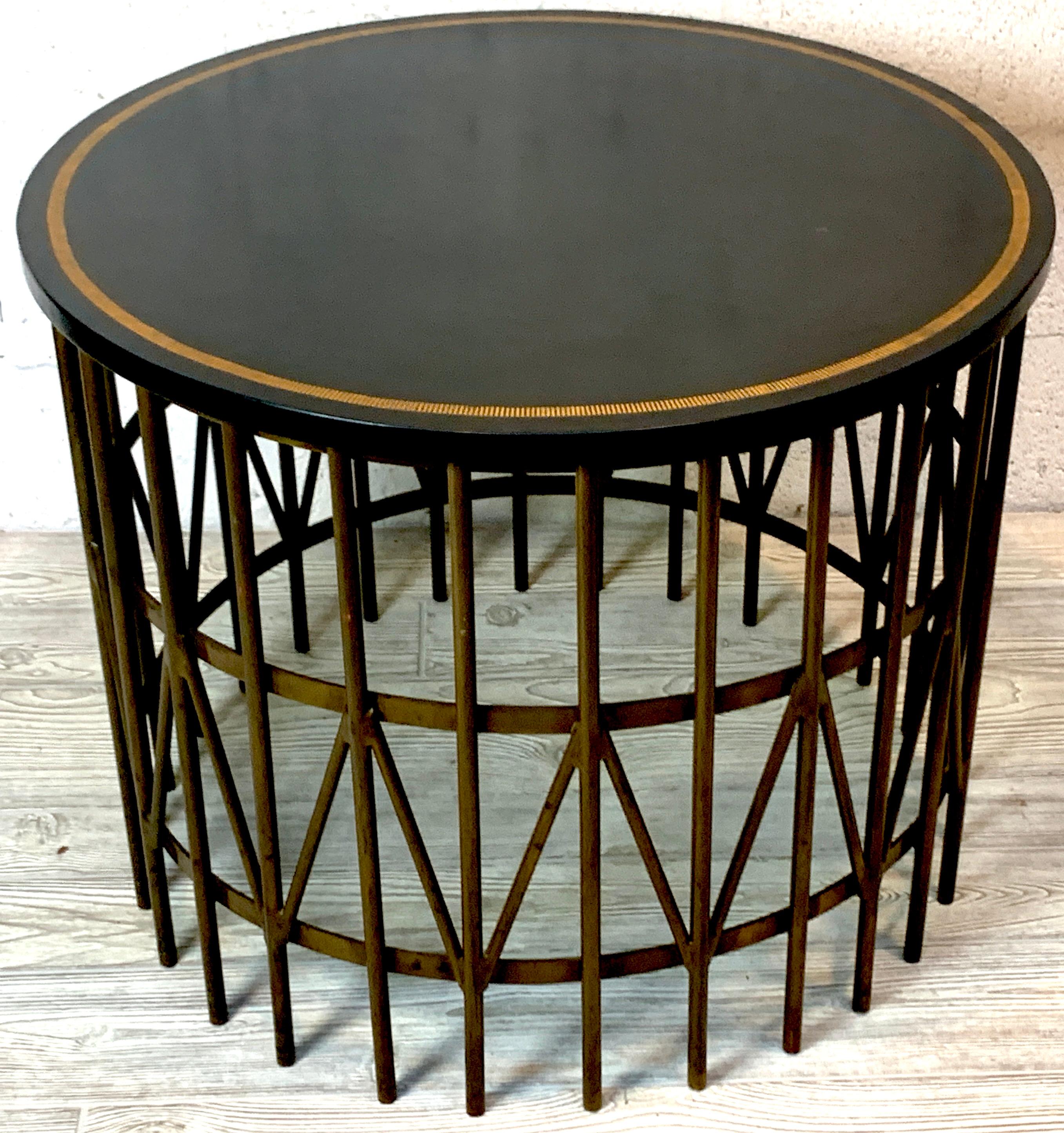 French Modern gilt green leather and brass guéridon, with circular gilt edge subtle green leather top, resting on a cast brass geometric base.