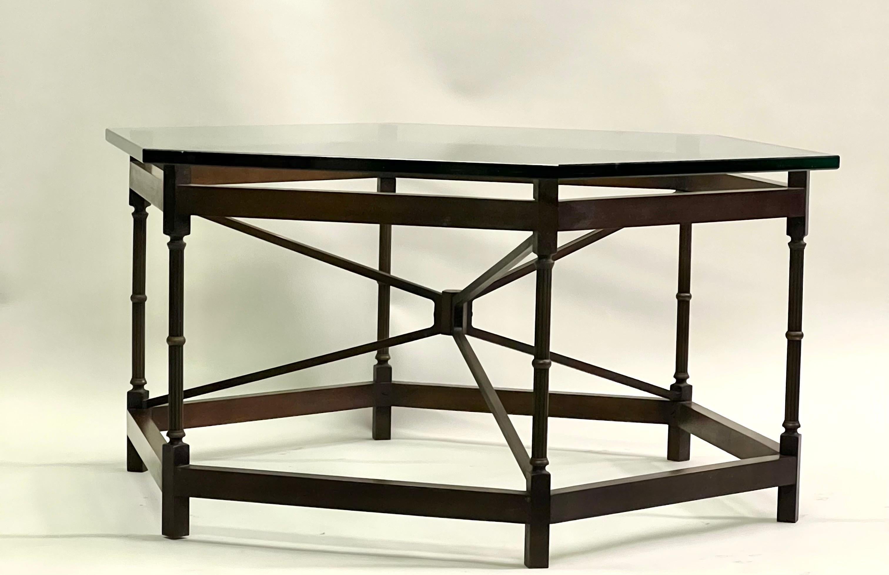An Elegant French Mid-Century Modern Neoclassical Coffee Table Attributed to Gilbert Poillerat and possibly for a design by Andre Arbus. The cocktail table utilizes refined materials and an exquisite sense of design. The pieces is in solid brass