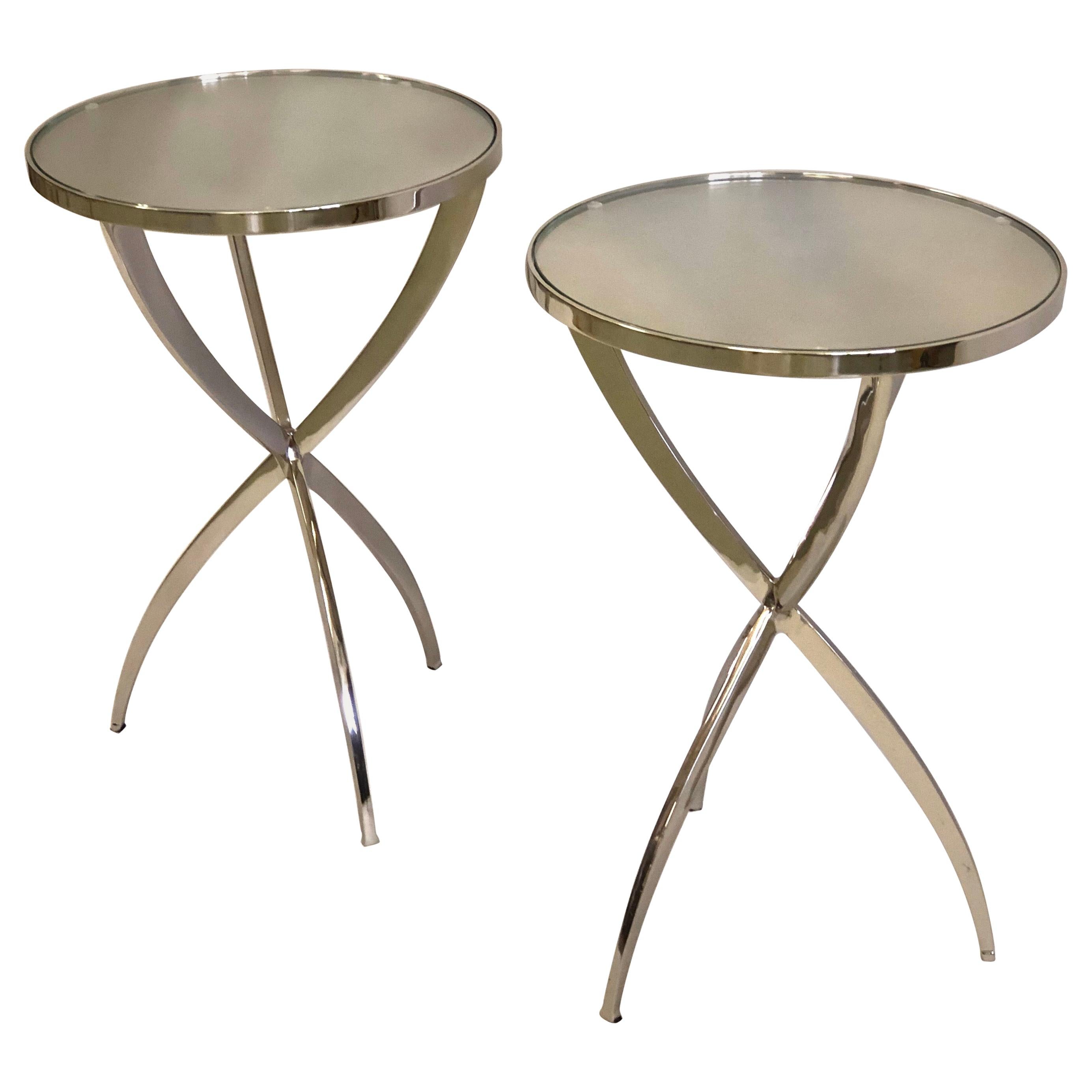 Elegant, sober and timeless pair of French midcentury style modern neoclassical end or side tables or gueridons in the style of French designer, Jacques Quinet.

The pieces feature the highest quality of design and manufacture are composed of