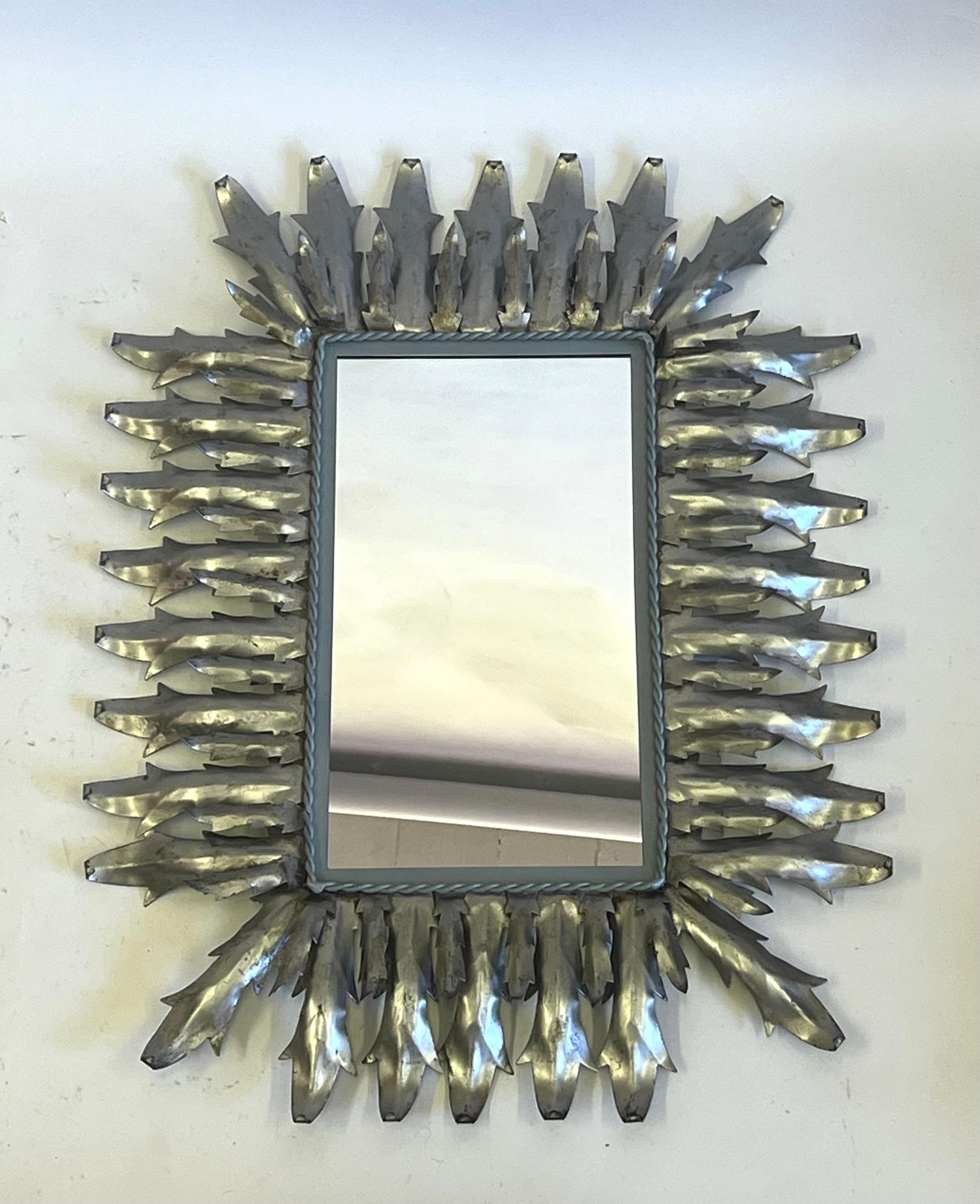 Français Miroir mural néoclassique français en acier et étain Sunburst, Gilbert Poillerat en vente