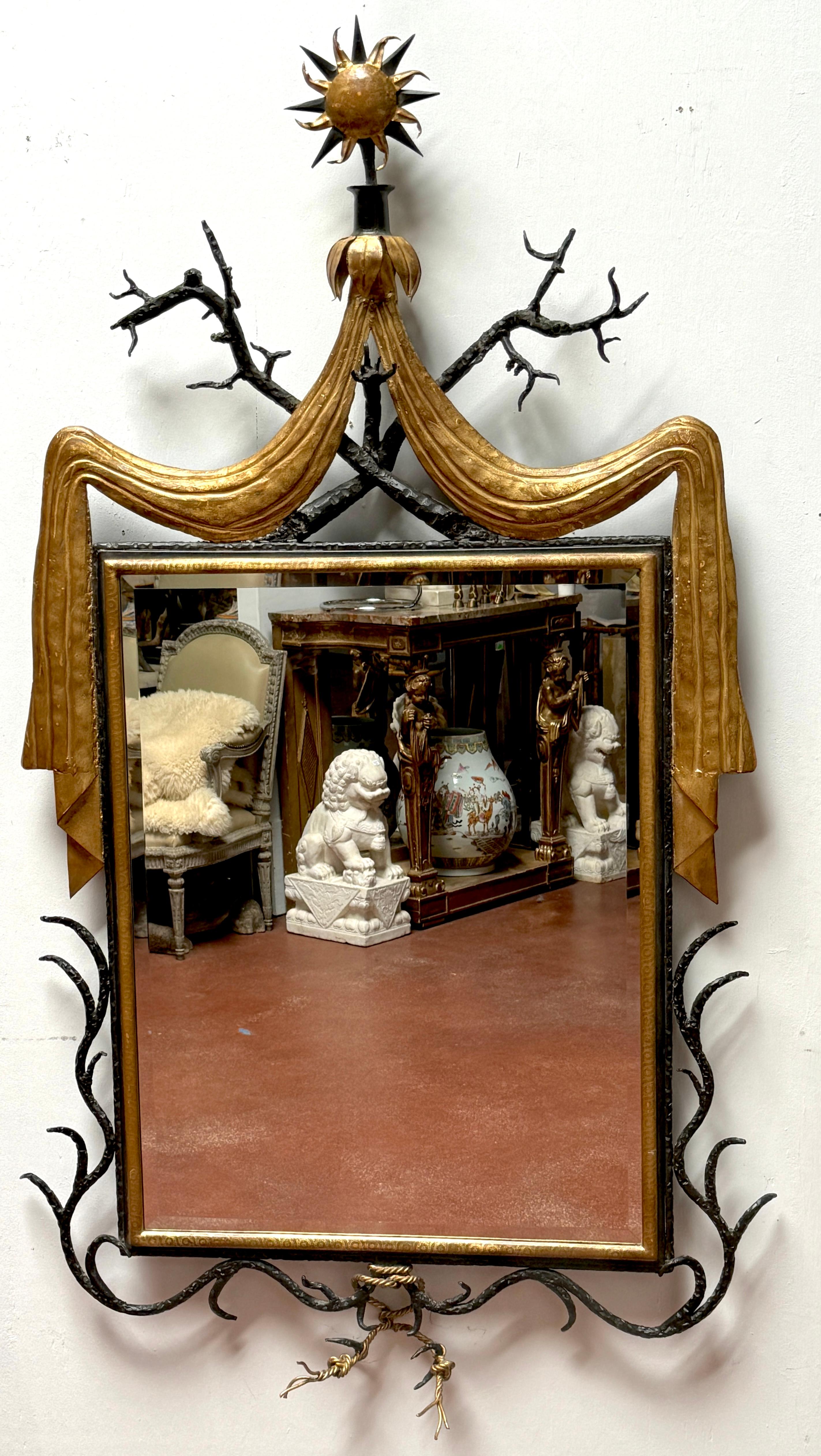 French Modern Parcel-Gilt Wrought Iron Mirror, Style of Gilbert Poillerat 
France, Later 20th Century 

A French Modern Parcel-Gilt Wrought Iron Mirror, inspired by the iconic designs of Gilbert Poillerat, is a stunning piece that seamlessly blends