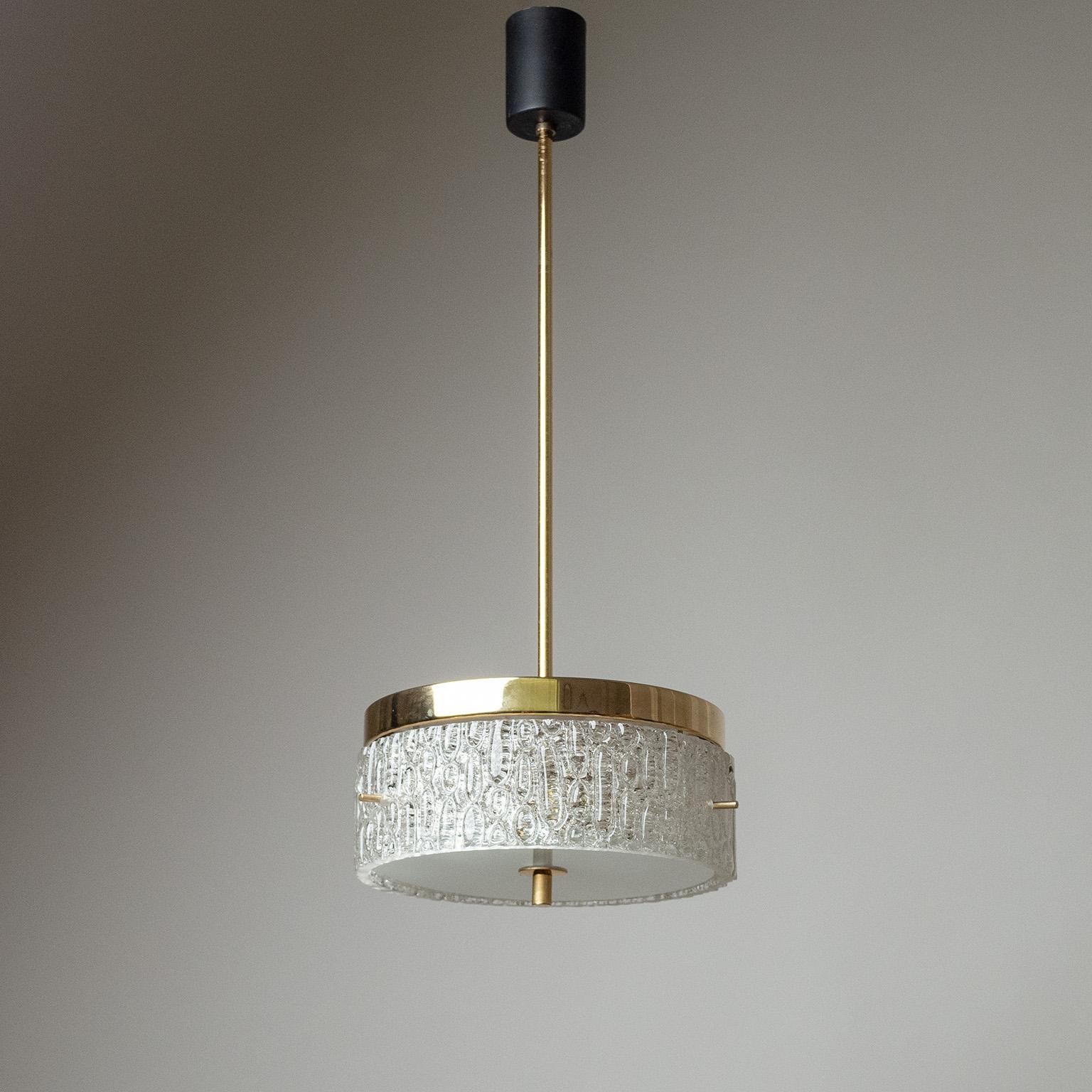 Fine French modernist ceiling light from the 1960s attributed to Maison Arlus. Minimalist gilt brass hardware with a thick and heavily textured glass diffuser. Two brass and ceramic E14 sockets with new wiring. Height without the stem is 11cm/4.3