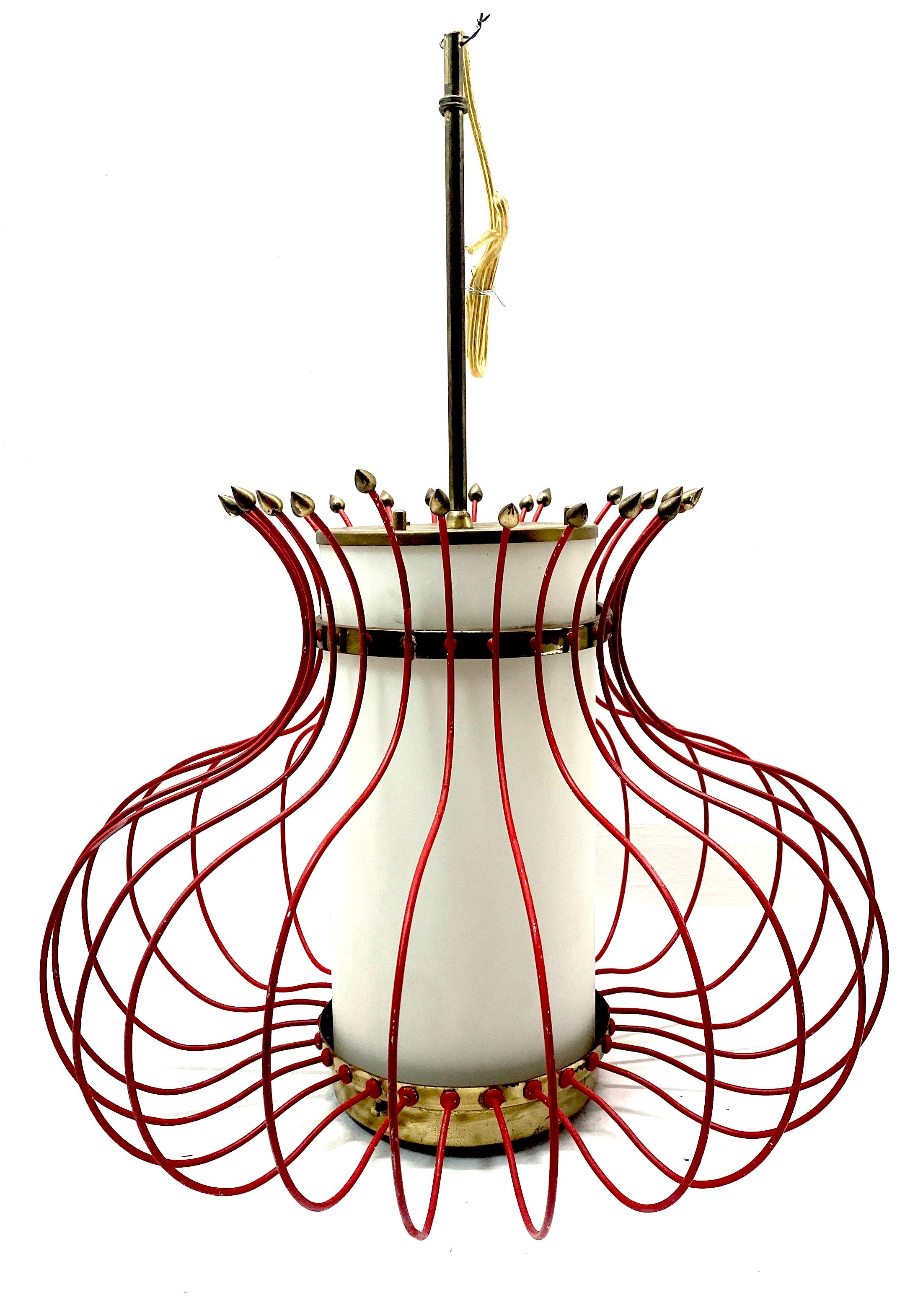 French Modern Red Enameled Brass Lantern/Chandelier
France, circa 1950s

A French Modern Red Enameled Brass Lantern/Chandelier from the 1950s. This captivating work features a distinctive down-swept design with a distinct red enameled brass frame