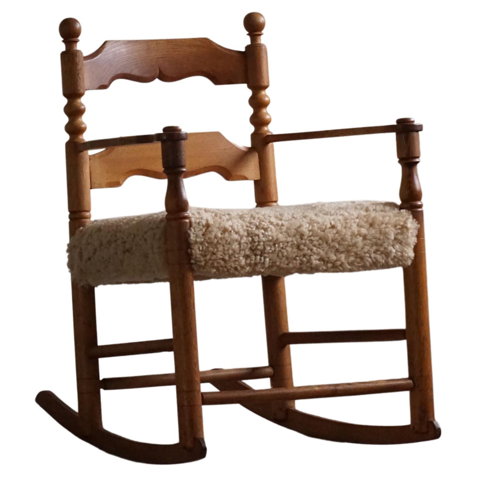 French Modern, Rocking Chair, Oak & Lambswool, Charles Dudouyt Style, 1950s For Sale