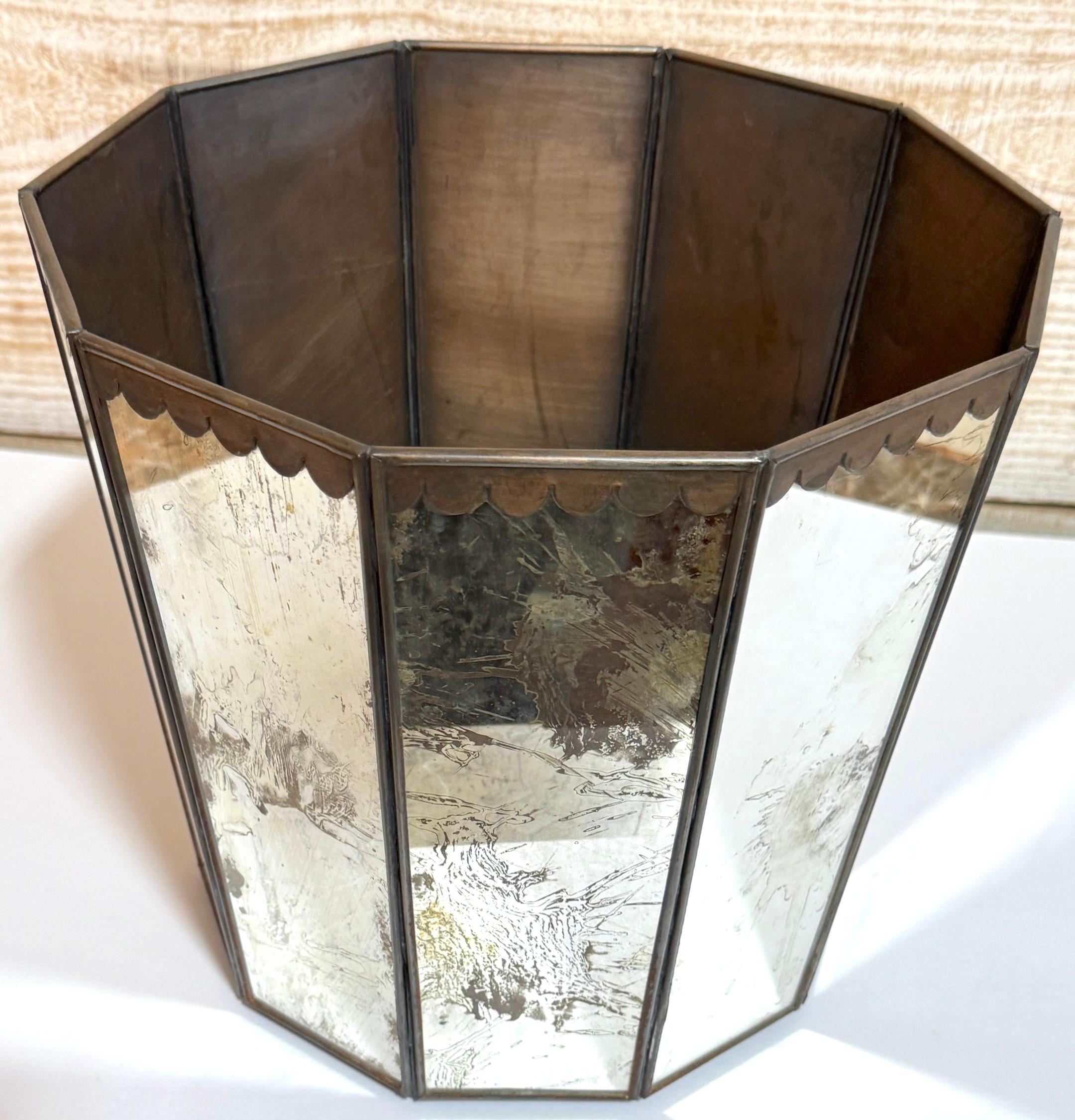 French Modern Style Decagon Patinated Mirror & Tole Wastepaper/Trash Can, France, Later 20th Century

This striking wastepaper or trash can, crafted in the French modern style, evokes the timeless elegance of Maison Jansen with its refined form and