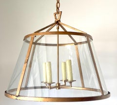 Lampe à suspension de style moderne français en métal doré et verre incurvé style Adnet