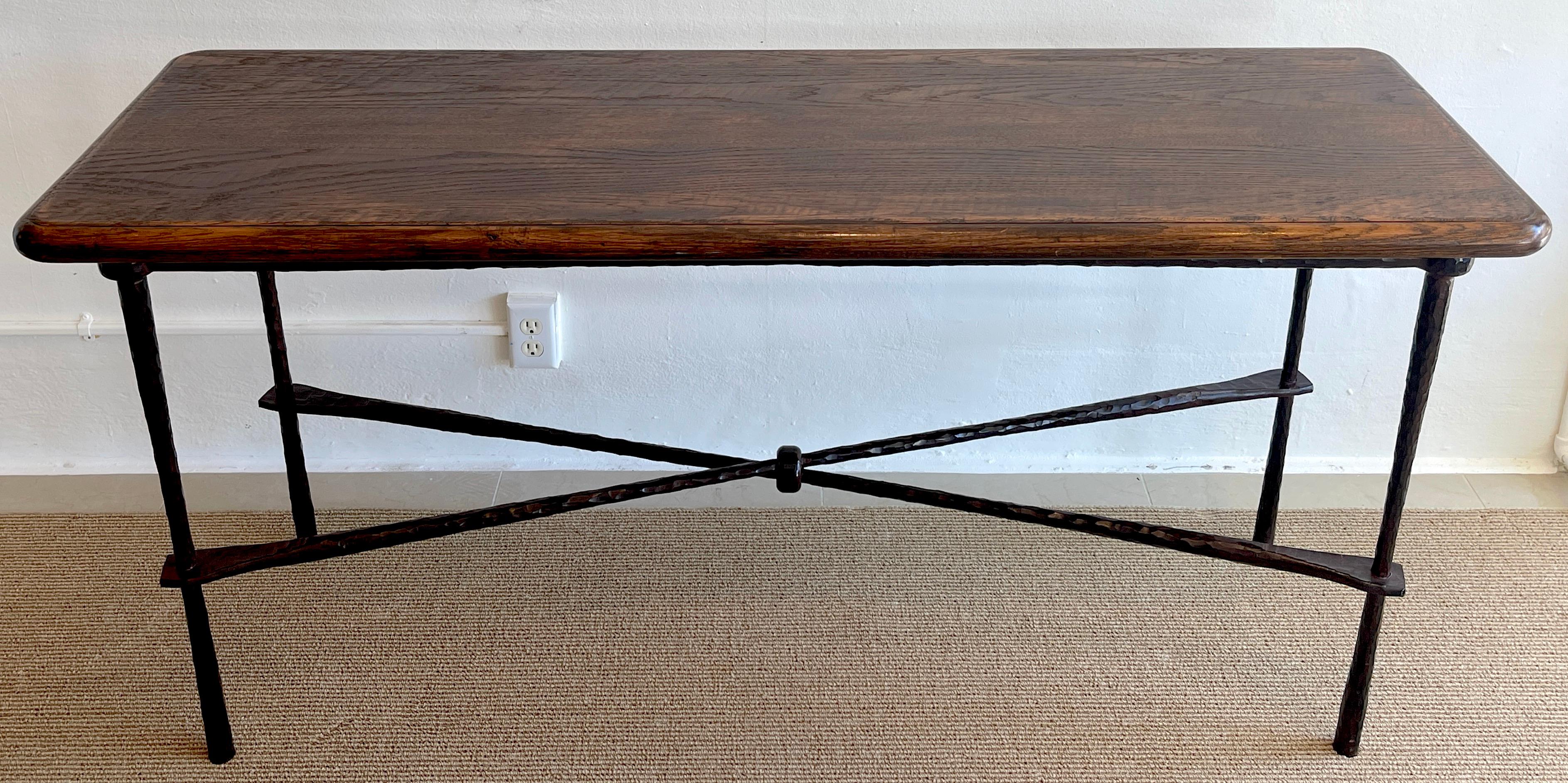 French modern wrought iron & walnut console table, of rectangular form with thick natural walnut top, on a substantial forged iron 'X