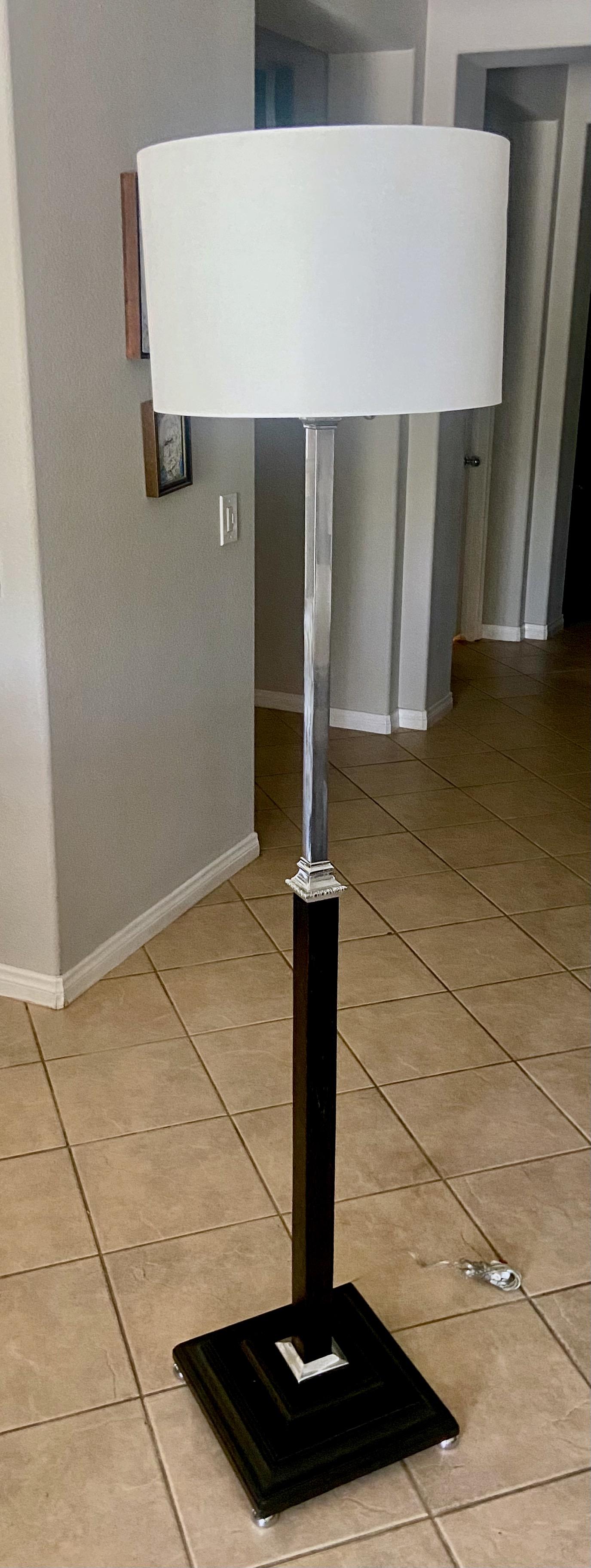 French large-scale moderne wood floor lamp with chrome-plated hardware and double cluster sockets. Newly ebonized lacquered finish in the manner of Parzinger. Newly wired for US. Shade not include and is shown for photography purposes only.