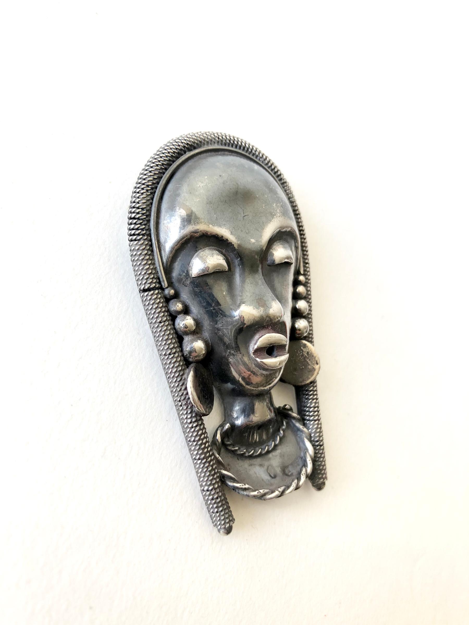 Large sterling silver tribal African native woman brooch, French circa 1940's.  Brooch measures 2.5