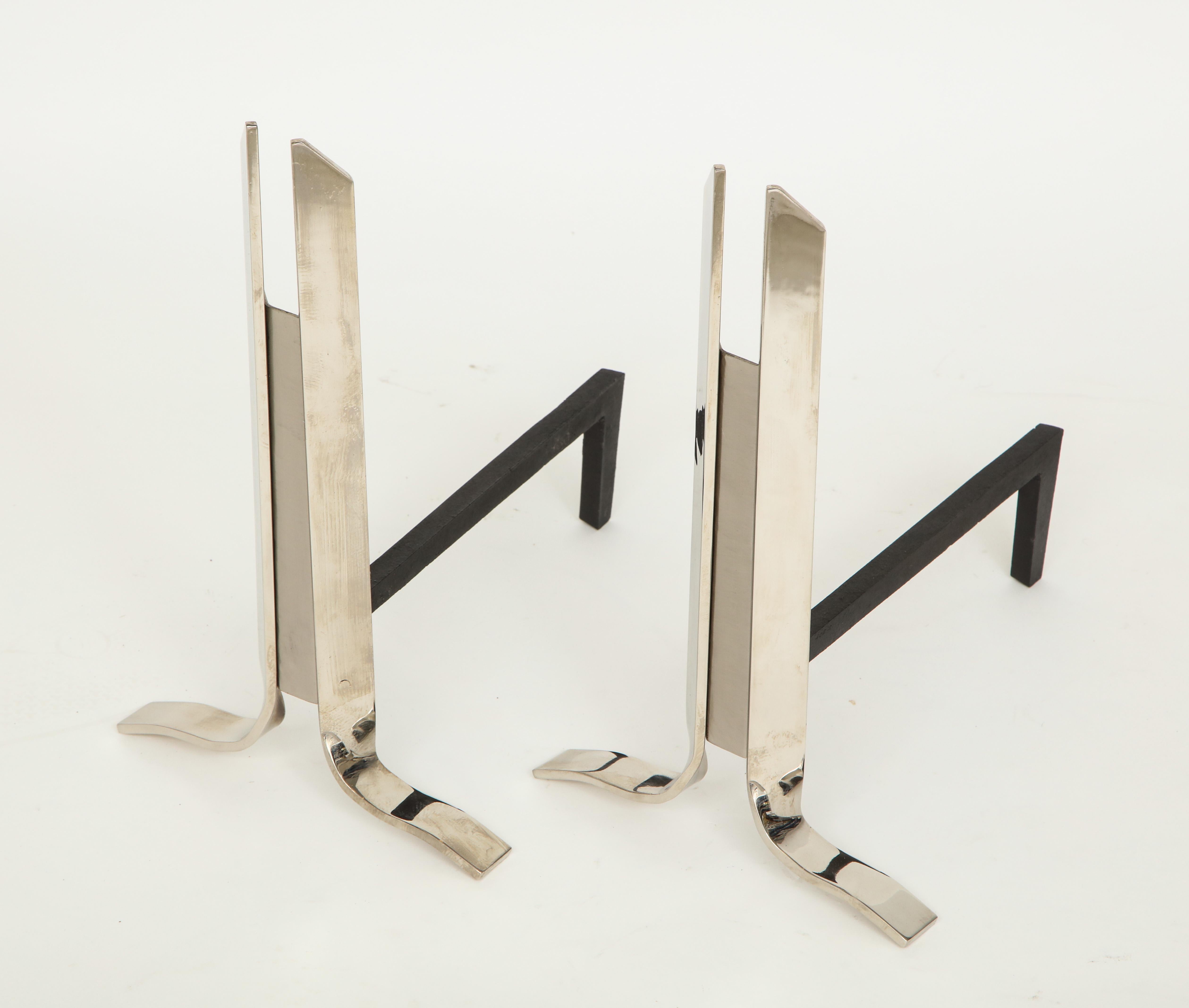 Pair of 1970s modernist andirons in polished and matte nickel.