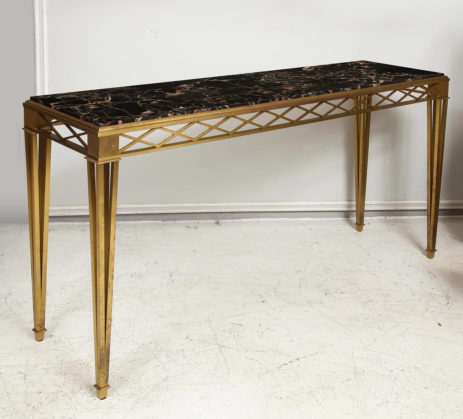 Bronze Marble-top Console in the Art Deco Manner on tapered legs.
