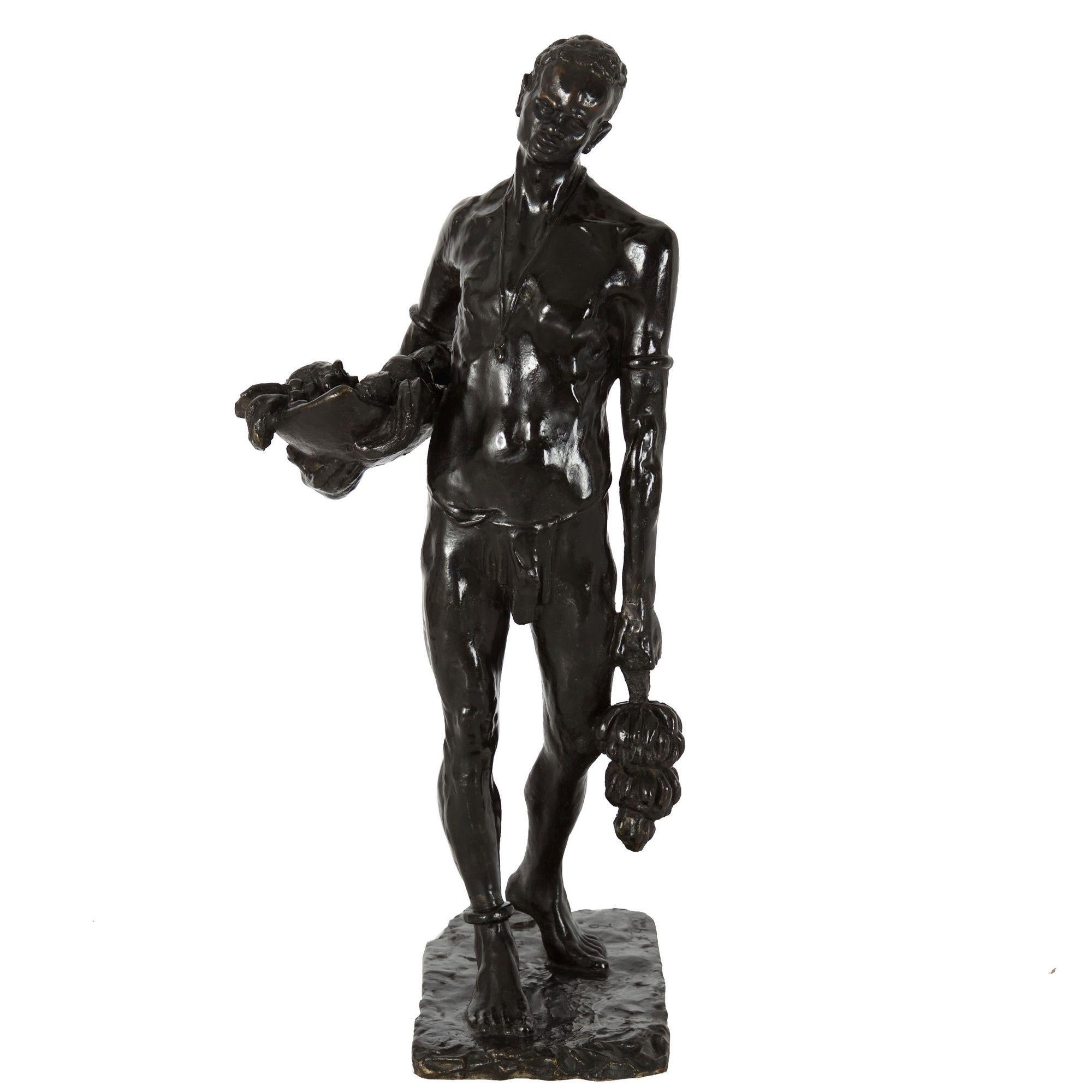A fine modernist casting using the lost-wax method in bronze, Le Porteur de Fruits is striking for its lack of refinement; where the bronze poured into the md was left with clear intentionality exactly as it coed with no intervention from the