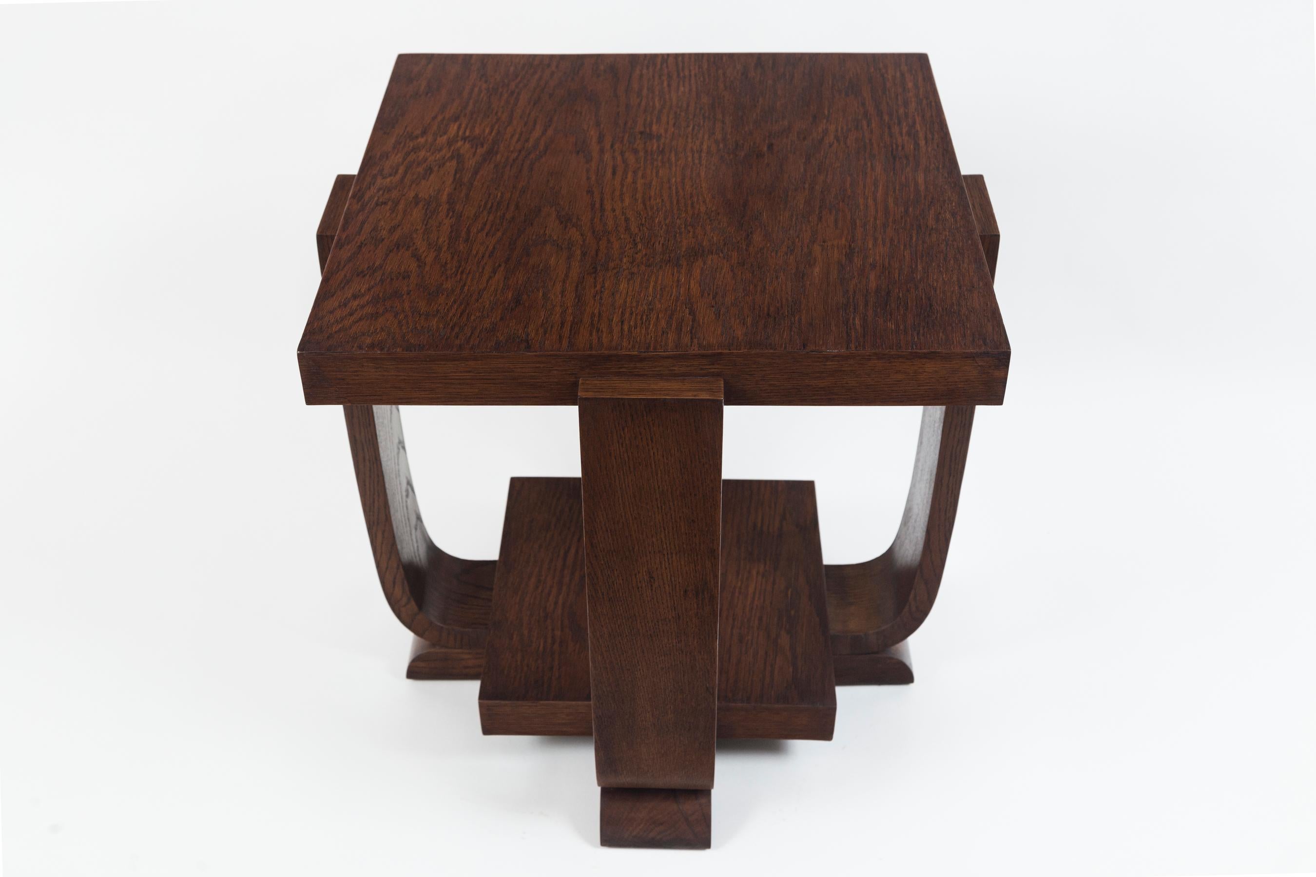 Lovely Modernist square two-tiered table with strong and simple geometric forms 
Date: 1940ca
Origin: France
Dimension: 19 3/4? square, 21 1/2? high.