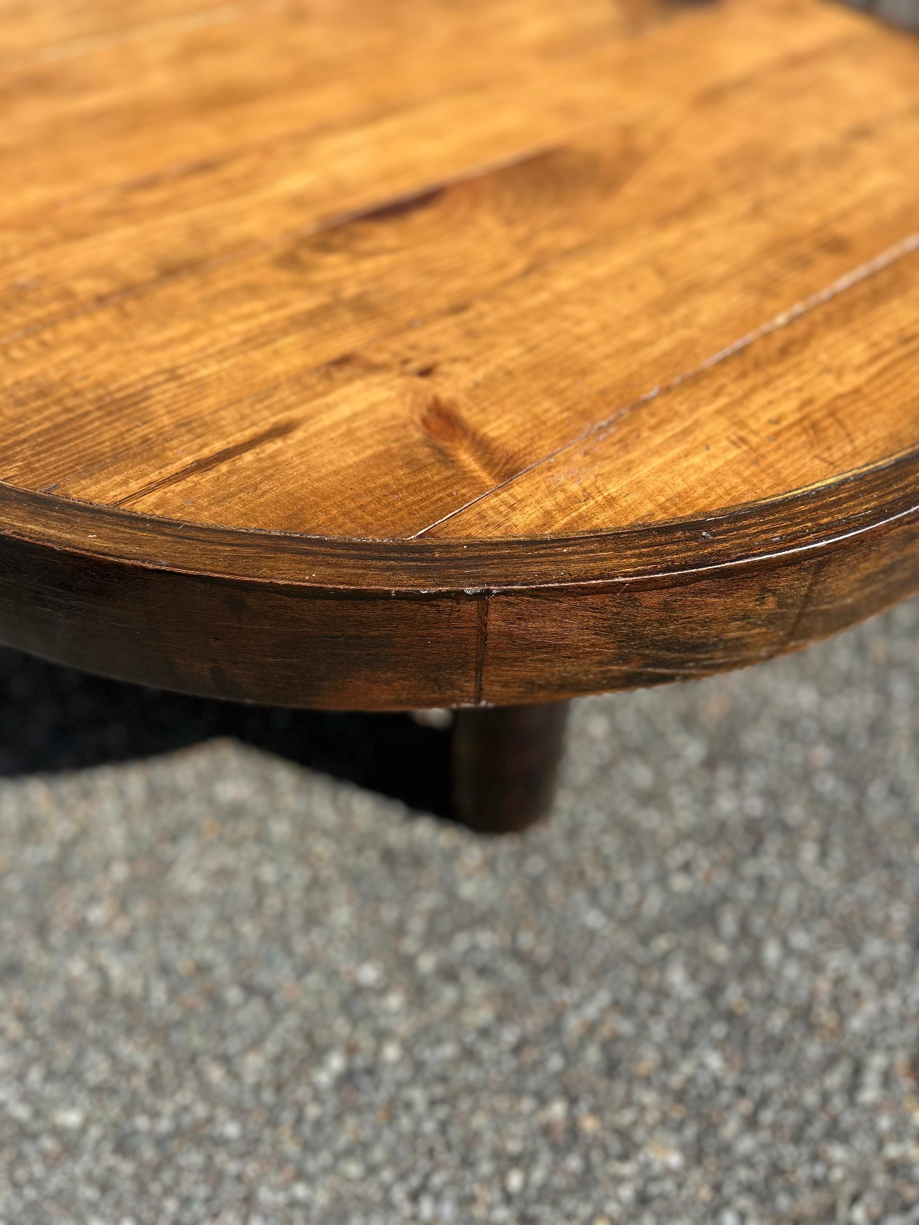 Hand crafted French mid century sofa/ coffe table in beautifully stained wood with an edge of stained solid beech wood, the table has beautiful round legs also made of solid beech.
The height of the table makes it perfect for any type of lounge