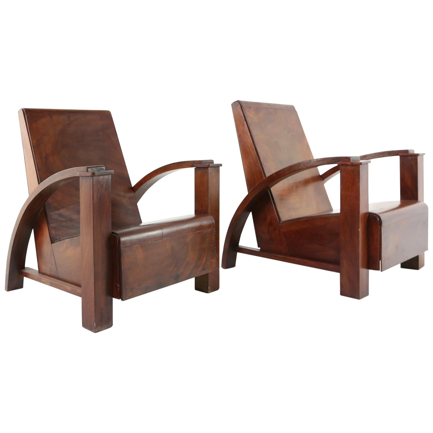 French Modernist Colonial Lounge Chairs in Mahogany, circa 1940s