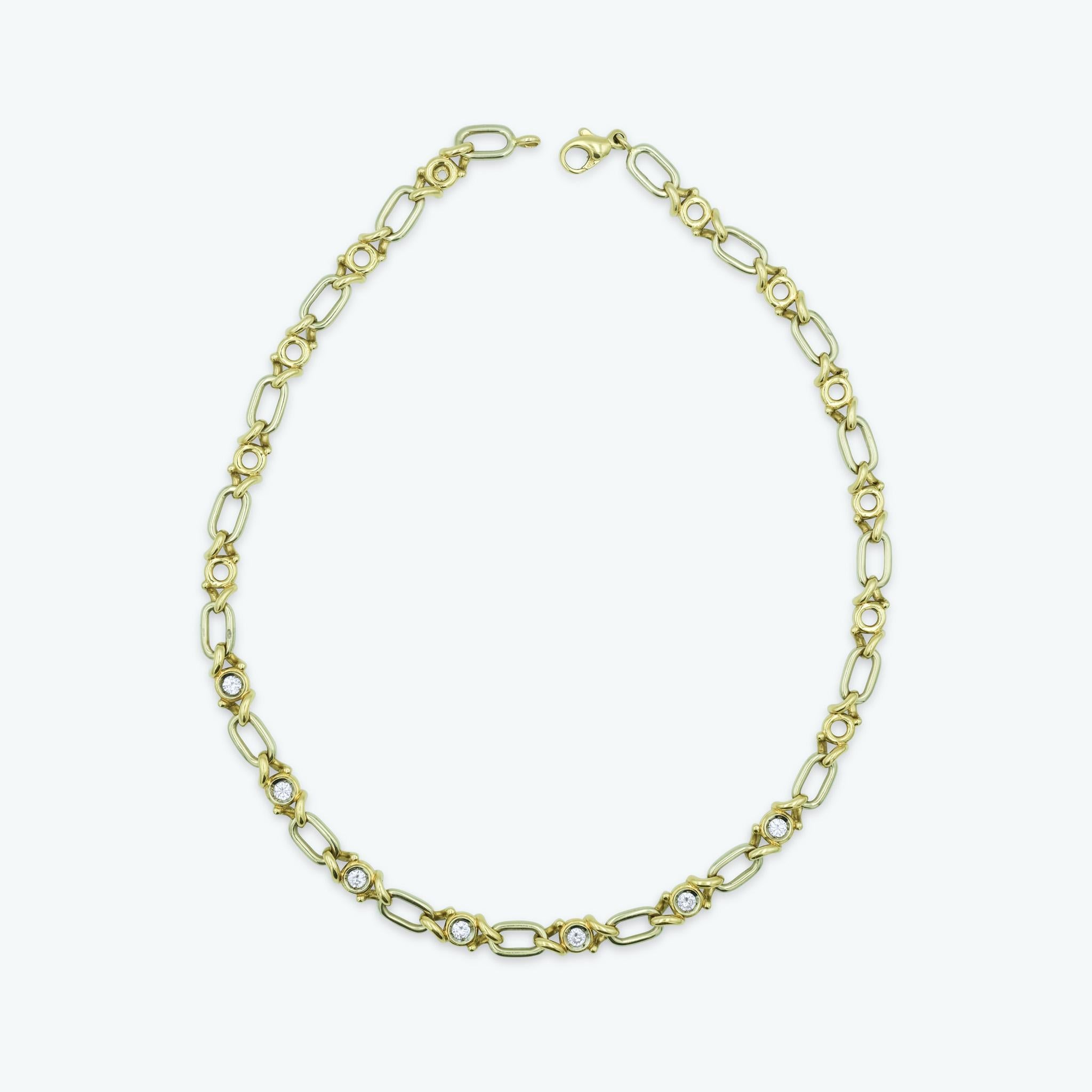 Introducing a luxurious 18 karat yellow gold chain by Fred Paris. This exquisite chain is set with 7 stones, a total of 1.7 carats, of VS brilliant-cut diamonds. Each diamond is securely nestled within elegant yellow gold links varying in different