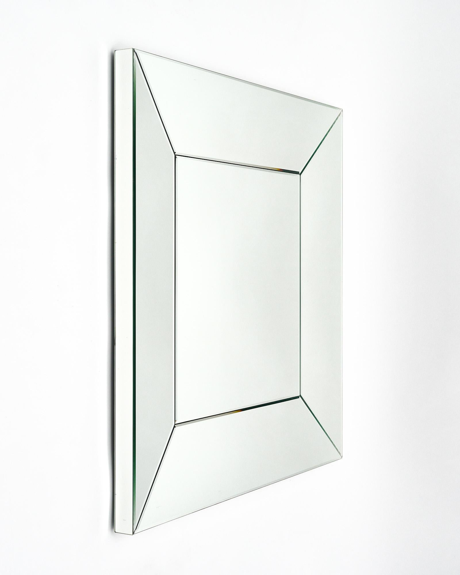 Mirror, French, in the Modernist style. The four beveled glass panels form the frame of this bold modernist mirror.
