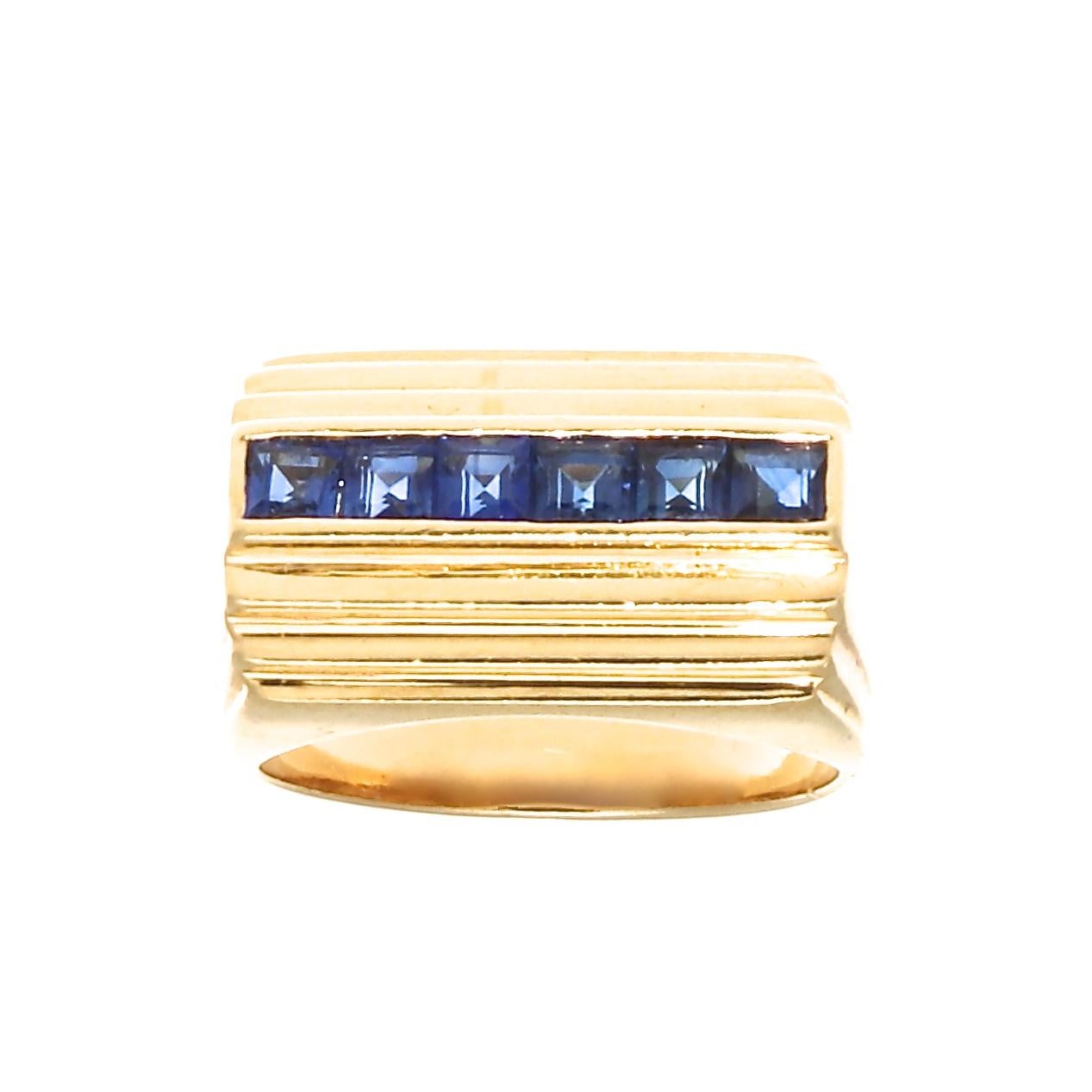 Modernism is a philosophical movement that, along with cultural trends and changes, arose from wide-scale and far-reaching transformations in Western society. Designed with a row of vibrant navy blue sapphires set between pillars of glistening 18k