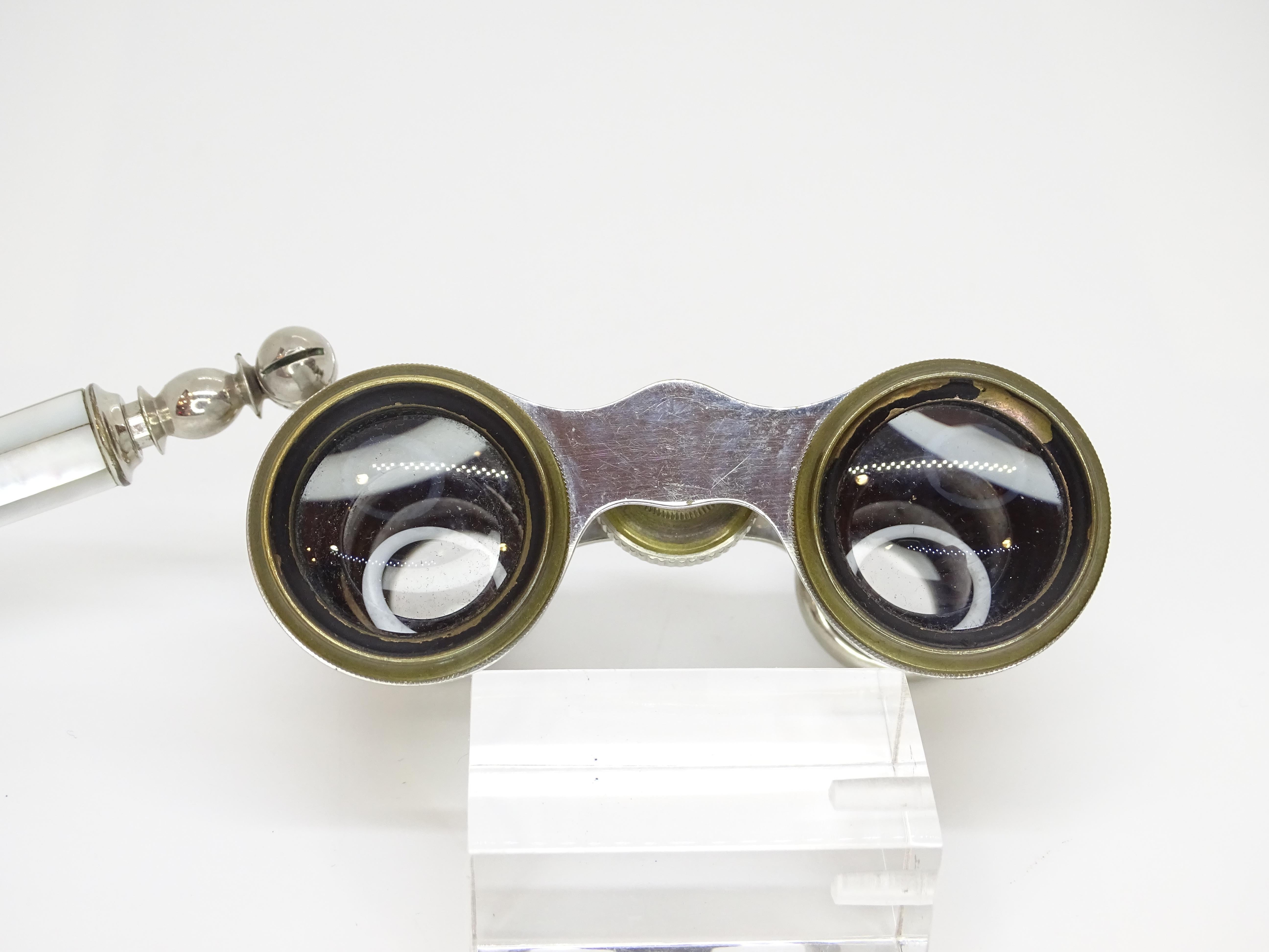 French mother of pearl binoculars or impertinent 7