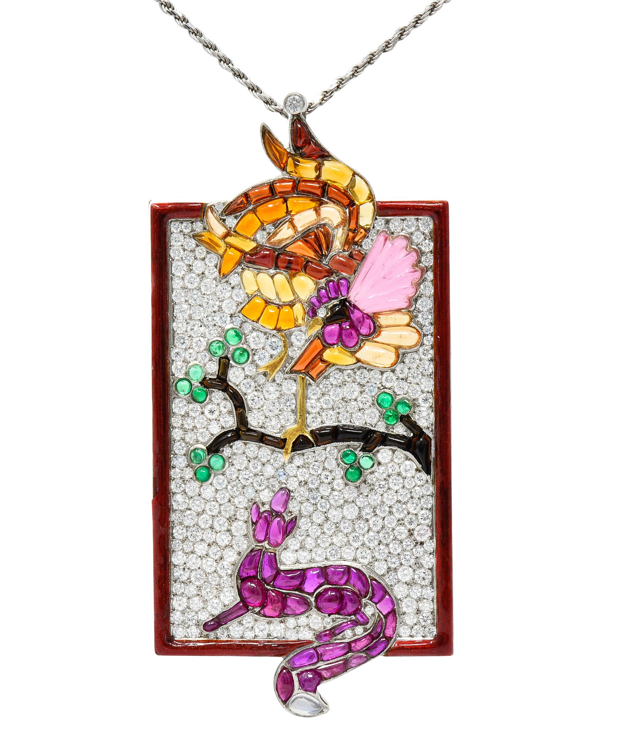 Large rectangular pavè diamond pendant depicts a fanciful scene of a fox provoking a bristled rooster

Rooster and fox are comprised of moonstones, rubies, sapphires, emeralds, onyx, and others

Cabochon calibrè cut to fit together in a colorful