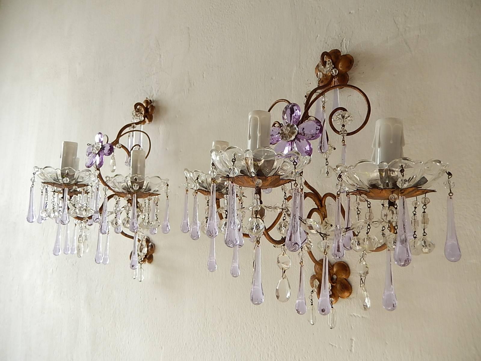 Housing three-light each, rewired and ready to hang. Crystal bobeches dripping with Murano lavender drops and underneath crystal prisms. Big flower in centre made up of lavender prisms. Crystal florets and prisms throughout.