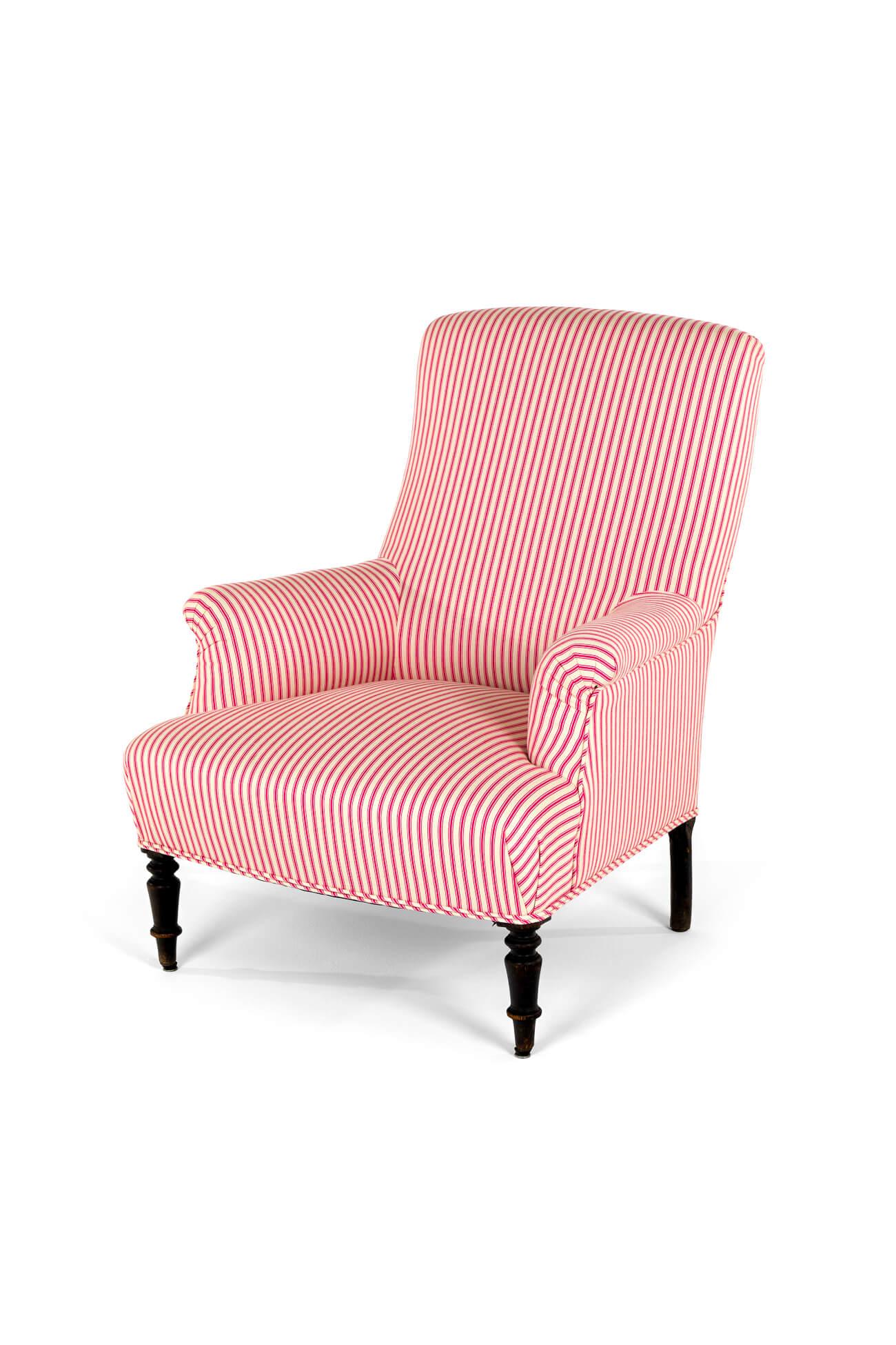 A 19th century French Napoleon III square back armchair with a tall back and a wide generous seat.

The walnut frame is raised on turned front legs and straight back legs.

The armchair has been fully restored and stripped back to the solid walnut
