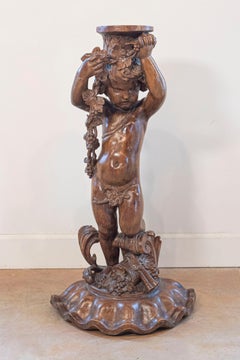 French Napoléon III 1860s Carved Walnut Sculpture of a Putto Carrying a Vessel
