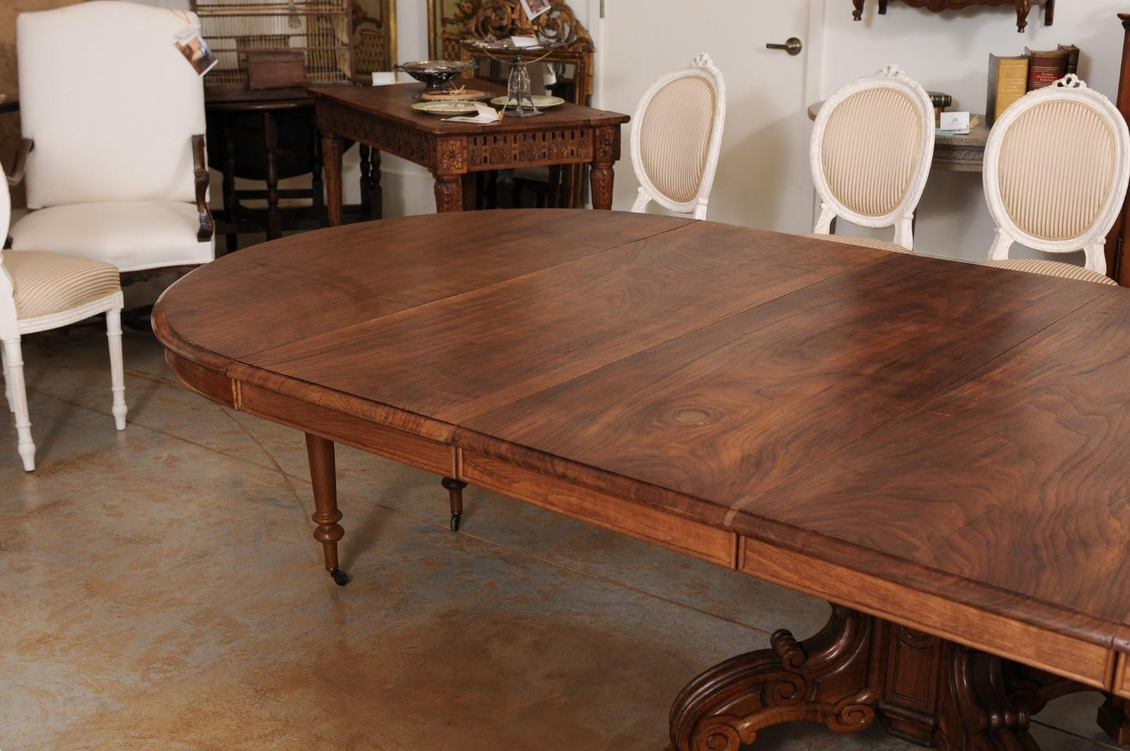 Carved French Napoleon III 1880s Walnut Extension Dining Table with Four Leaves For Sale