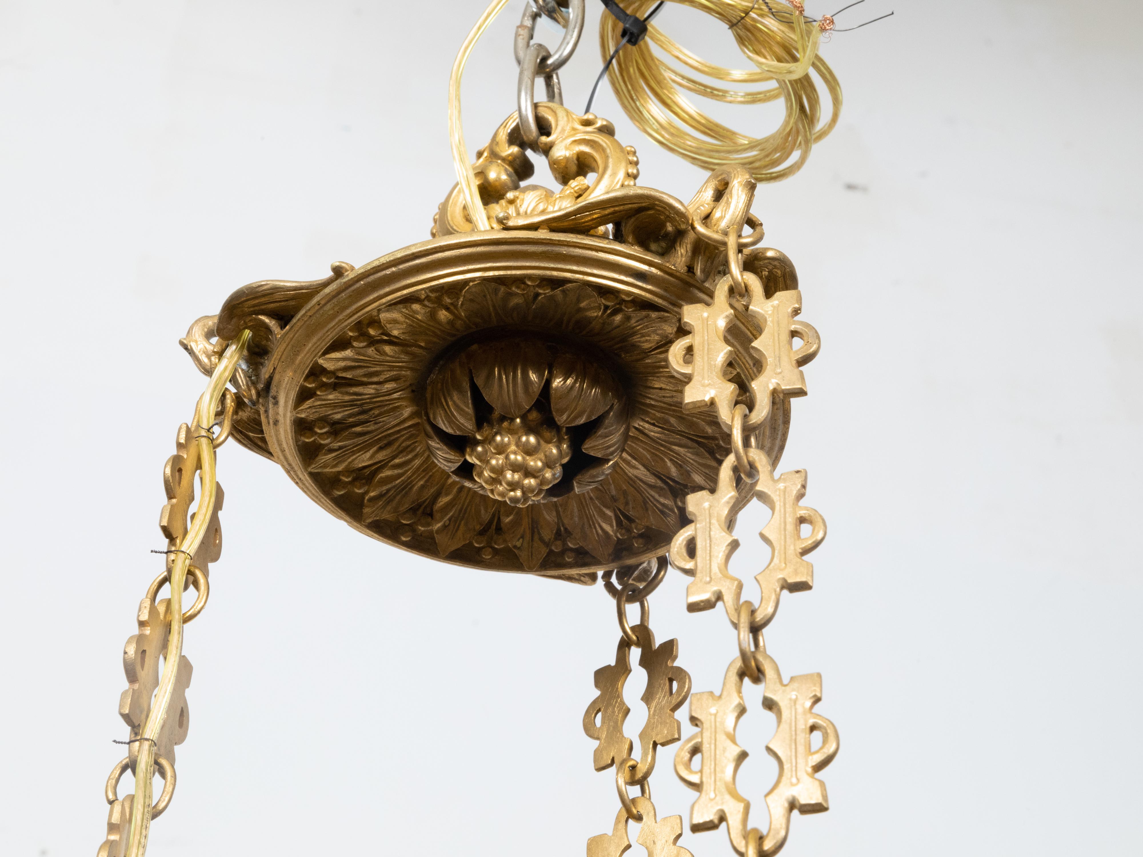 French Napoléon III 19th Century Gilt Bronze 12 Light Chandelier with Mascarons For Sale 8