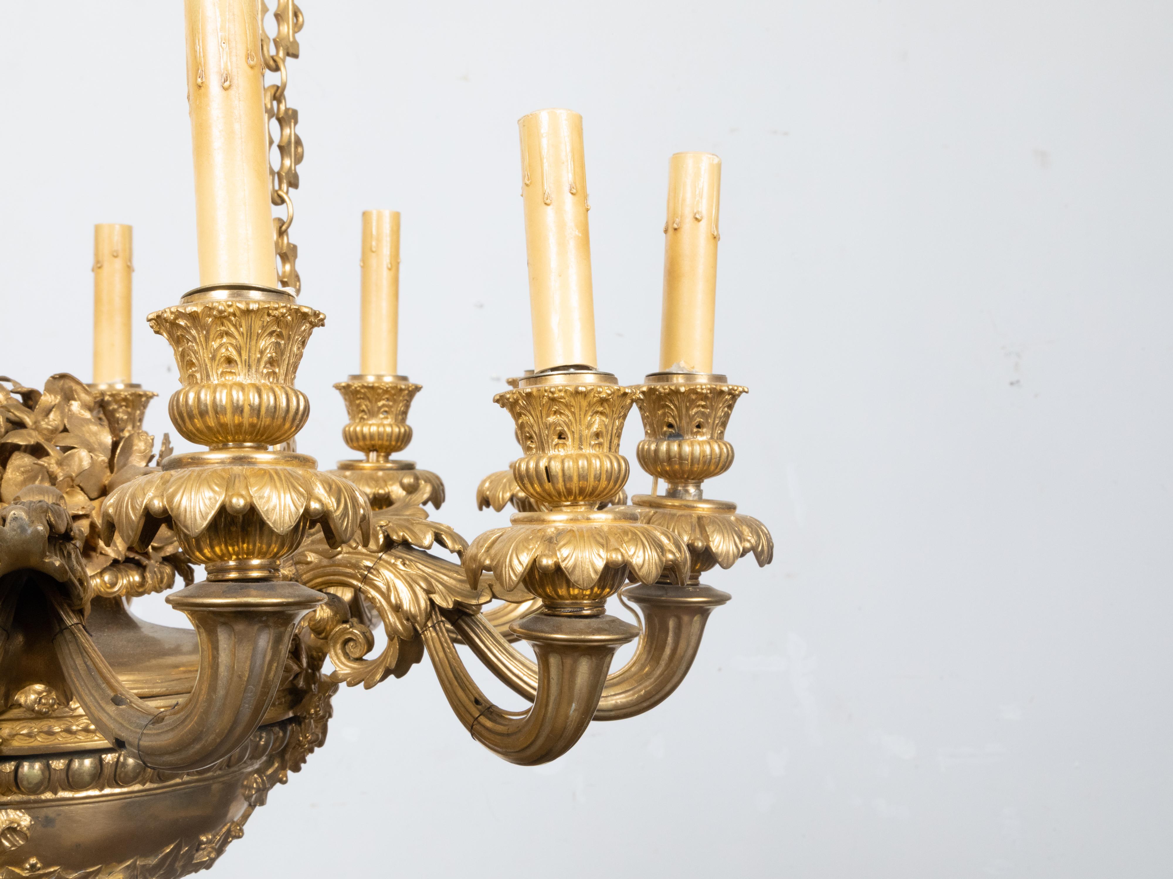 French Napoléon III 19th Century Gilt Bronze 12 Light Chandelier with Mascarons For Sale 11