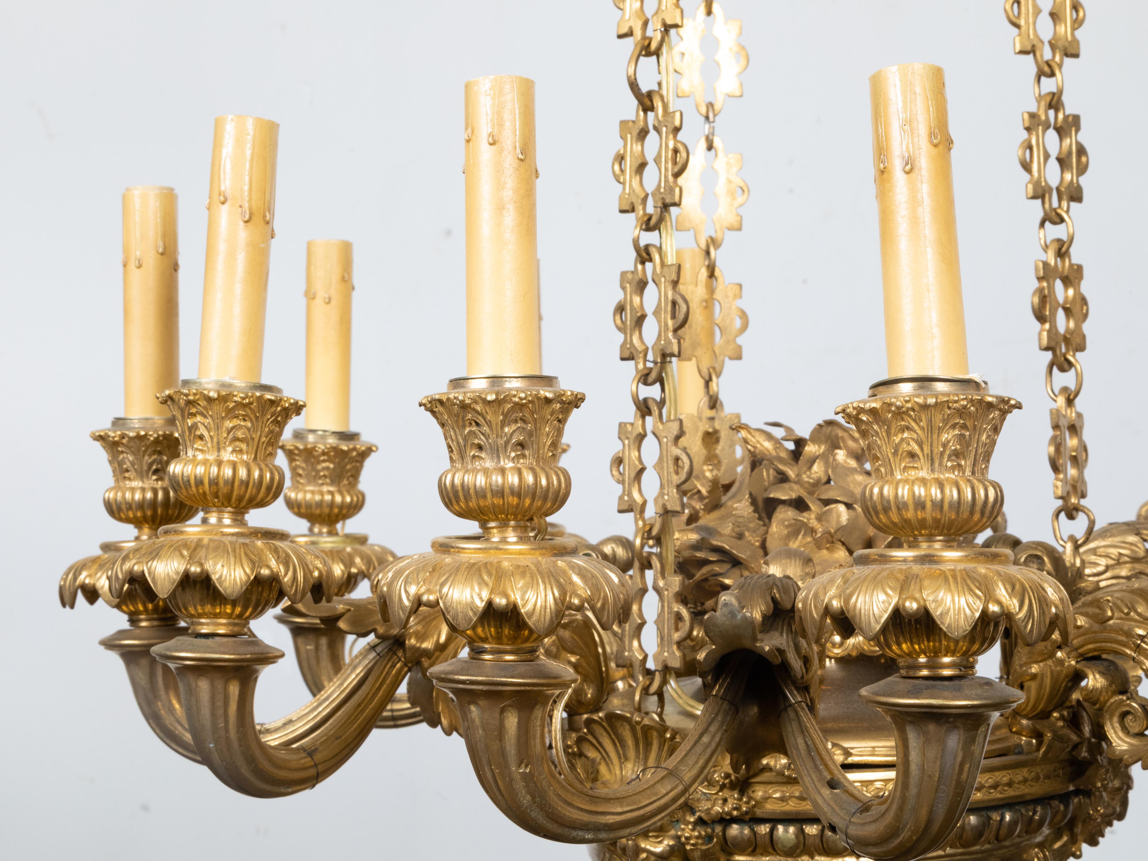 French Napoléon III 19th Century Gilt Bronze 12 Light Chandelier with Mascarons For Sale 12
