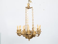 French Napoléon III 19th Century Gilt Bronze 12 Light Chandelier with Mascarons