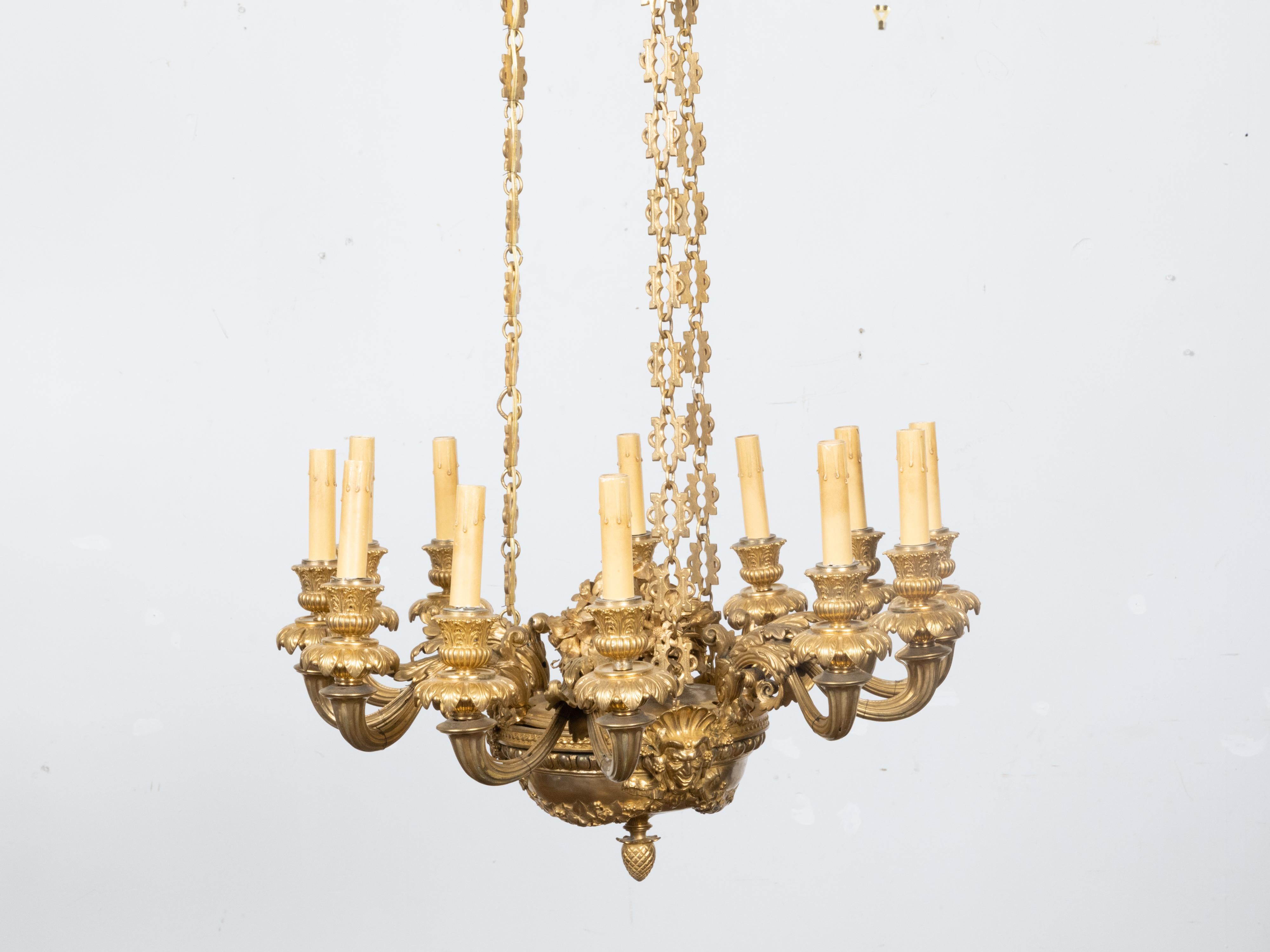 Napoleon III French Napoléon III 19th Century Gilt Bronze 12 Light Chandelier with Mascarons For Sale